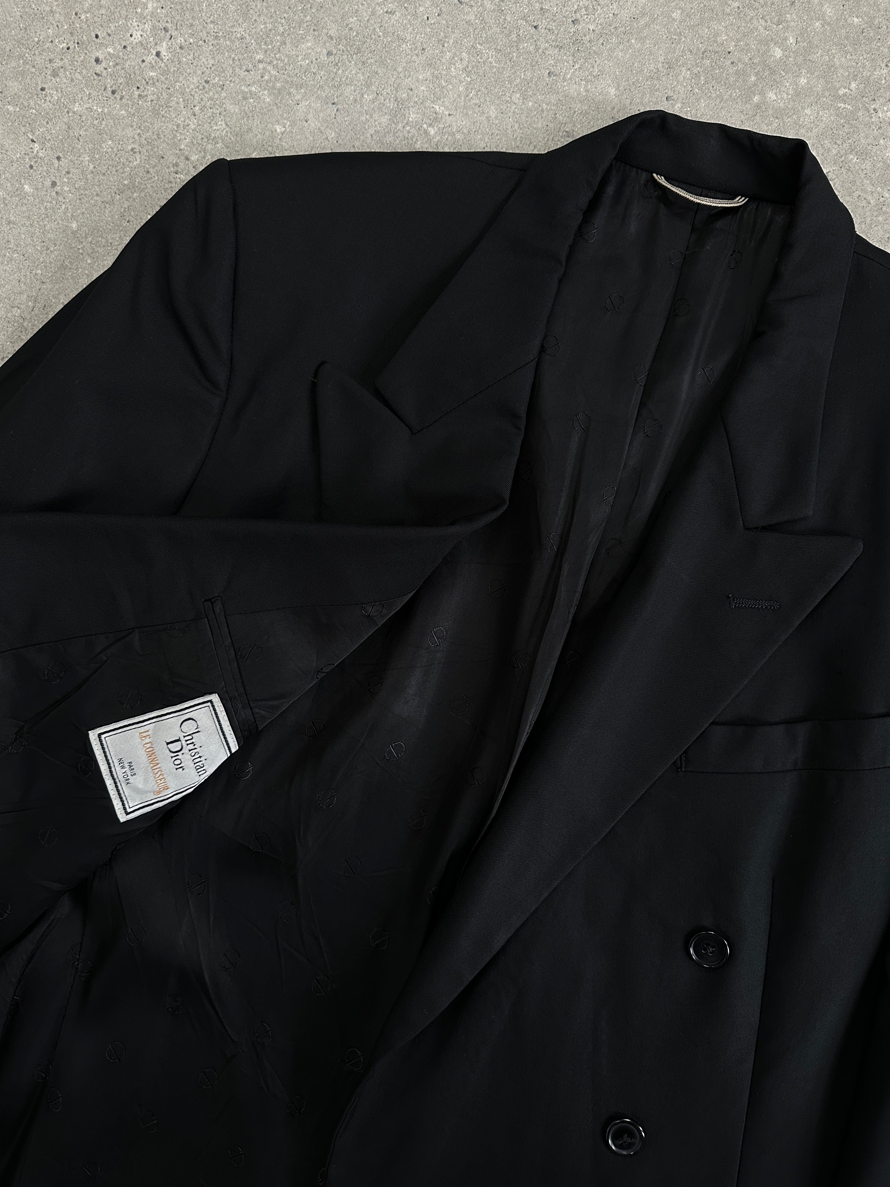 Christian Dior pure wool double-breasted blazer in size L/XL, tailored fit with classic lapels and button details