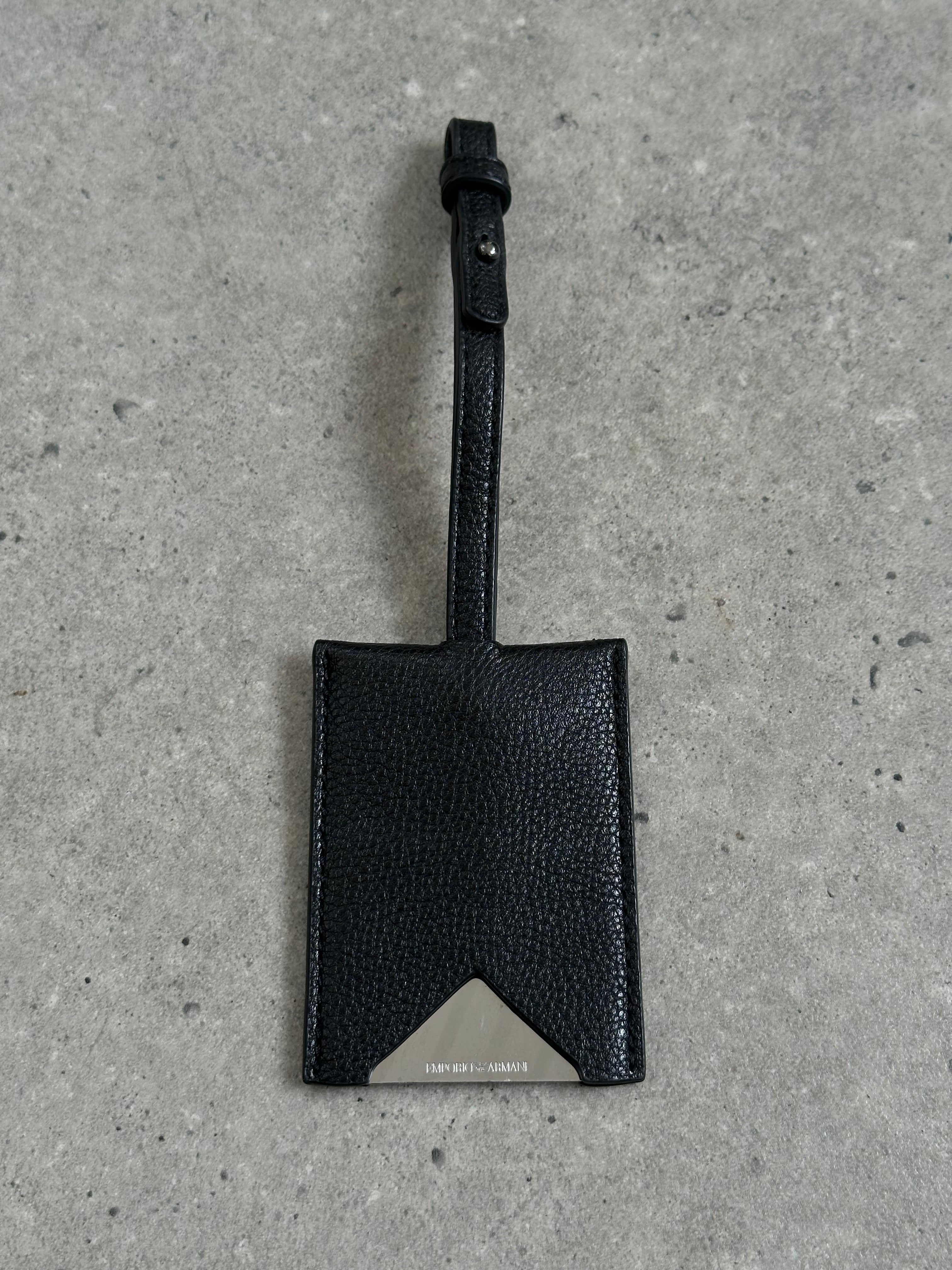 Emporio Armani pleated shoulder bag with structured design and metallic accents, stylish and versatile accessory.