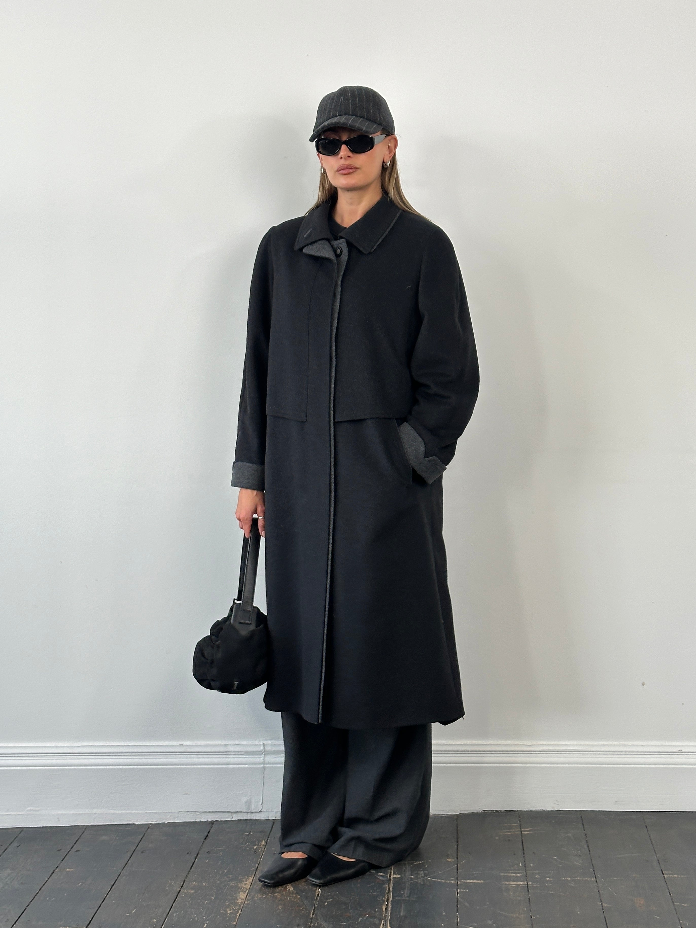 Vintage 1990s wool coat with concealed placket, size large, classic timeless design and textured fabric.