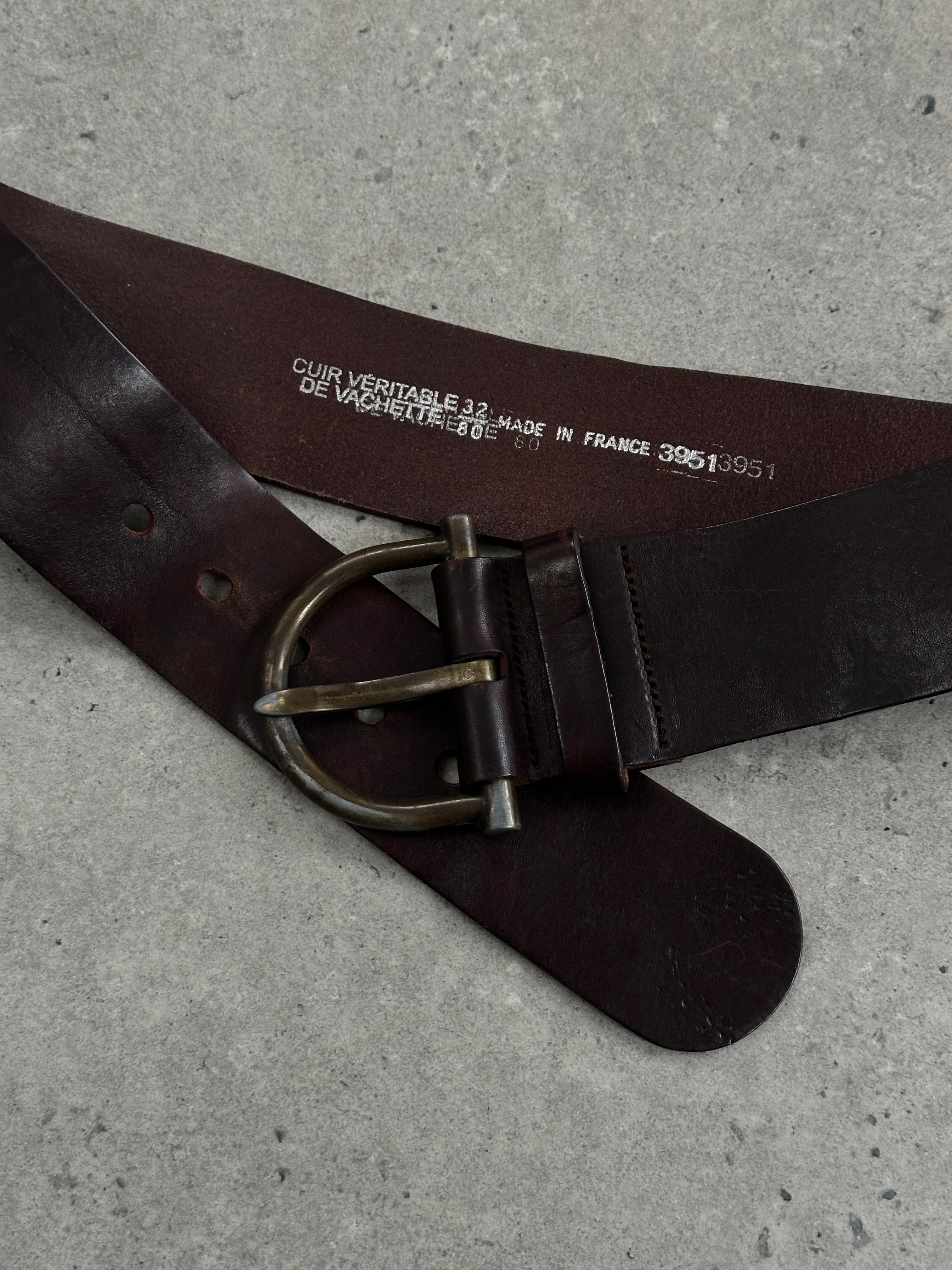 Vintage French 1980s chunky leather belt with brass buckle, adjustable W30-34, classic retro style, durable leather craftsmanship.