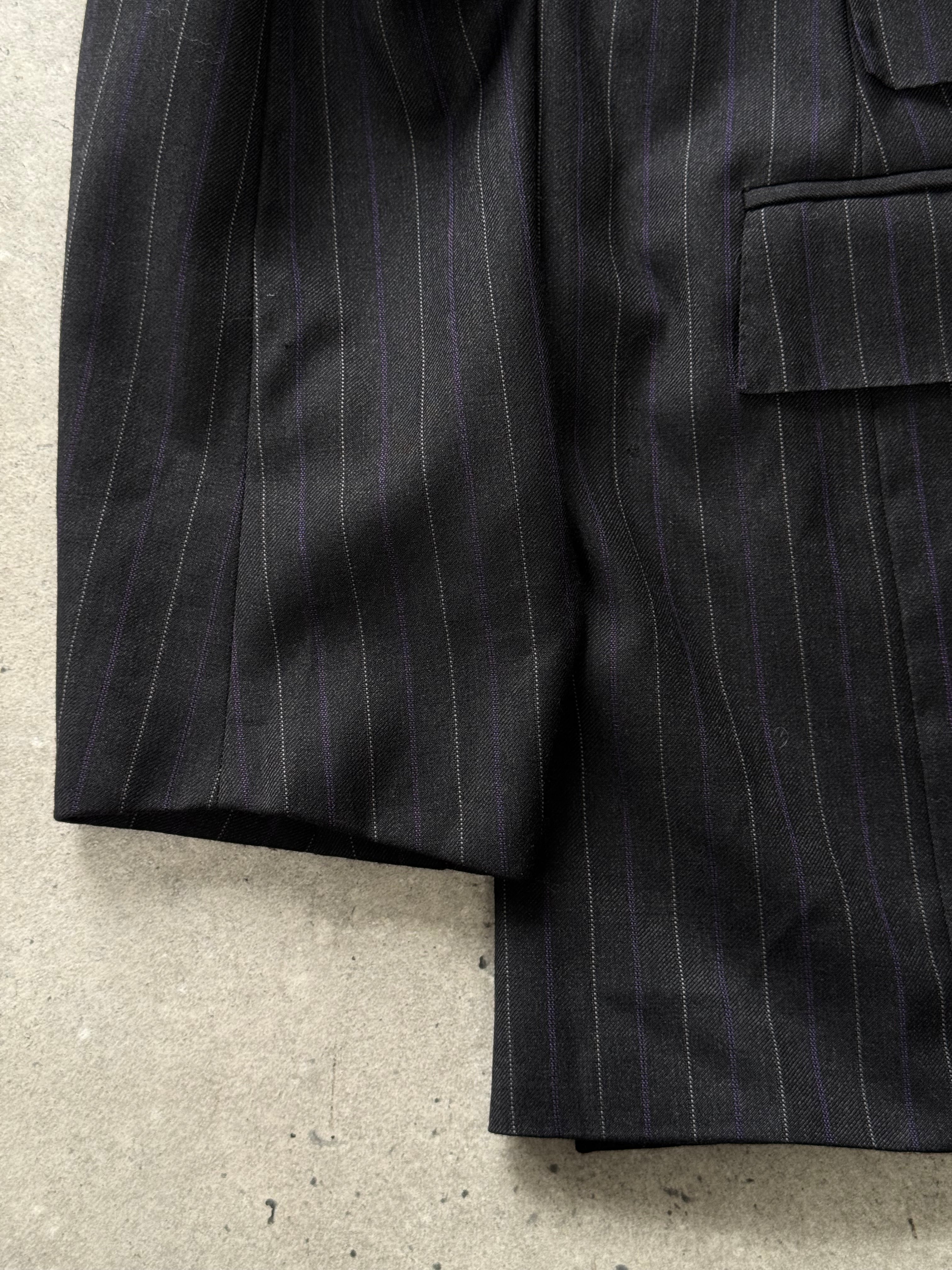Ralph Lauren Polo 2000s pure wool stripe blazer in size large/extra large, featuring classic tailored fit and multicolor stripe pattern.