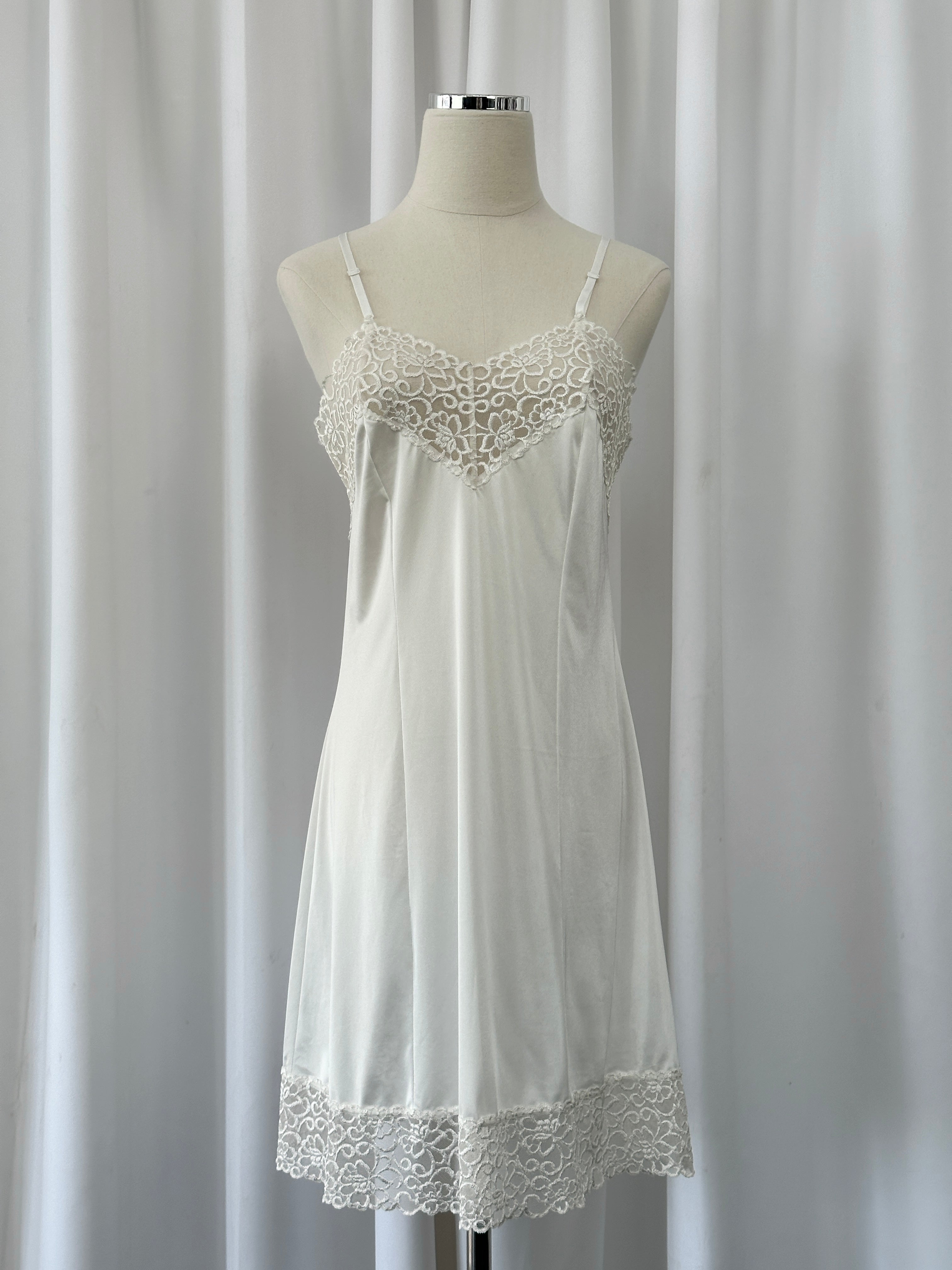 Japanese vintage 1990s lace sheer mini slip dress in size S with delicate lace detailing and lightweight fabric.