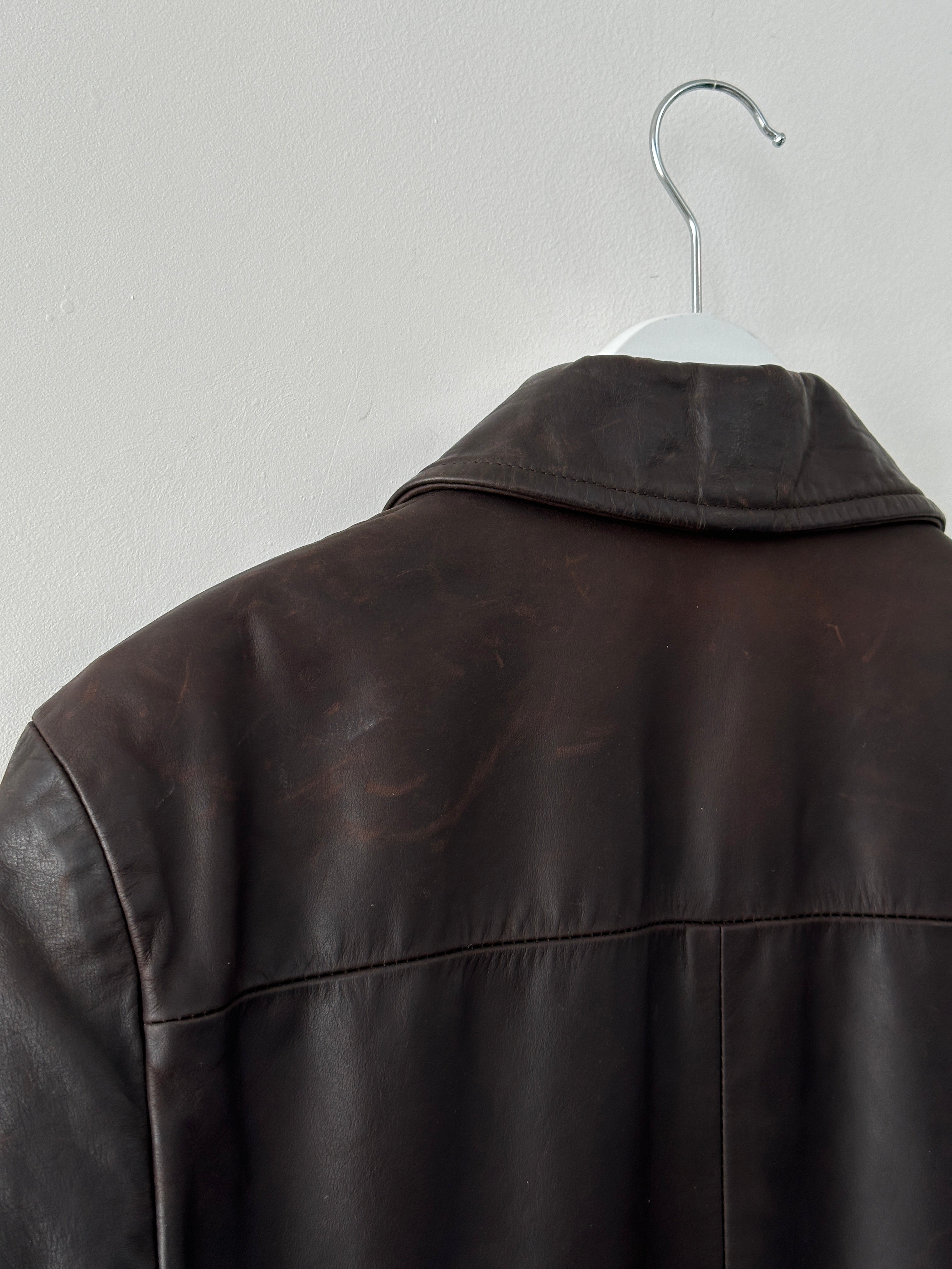 Emporio Armani leather jacket for men, size small, featuring classic black leather with sleek design and subtle branding.