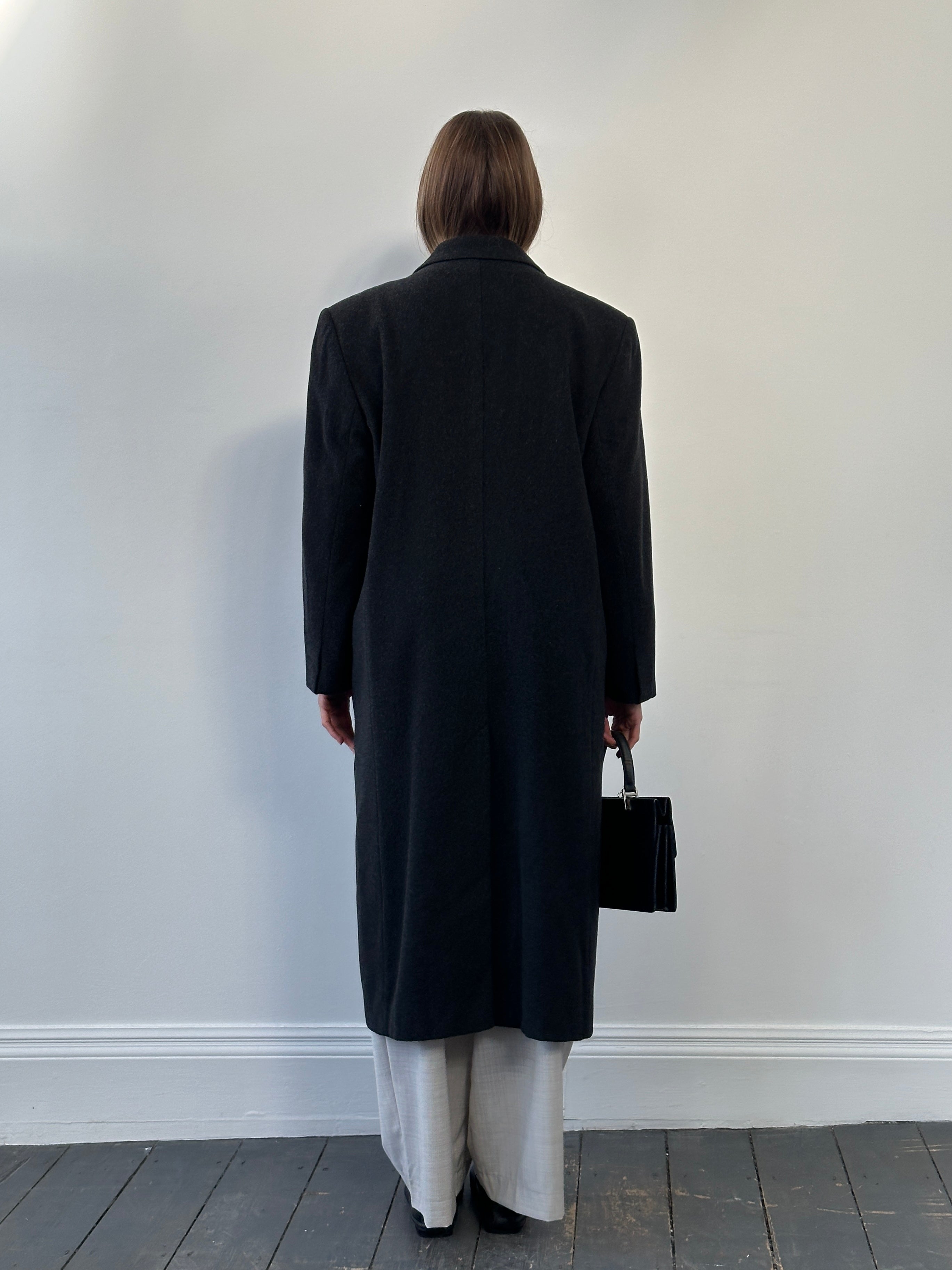 Vintage Italian 1980s double-breasted pure wool coat in XL size, showcasing classic design and textured fabric.