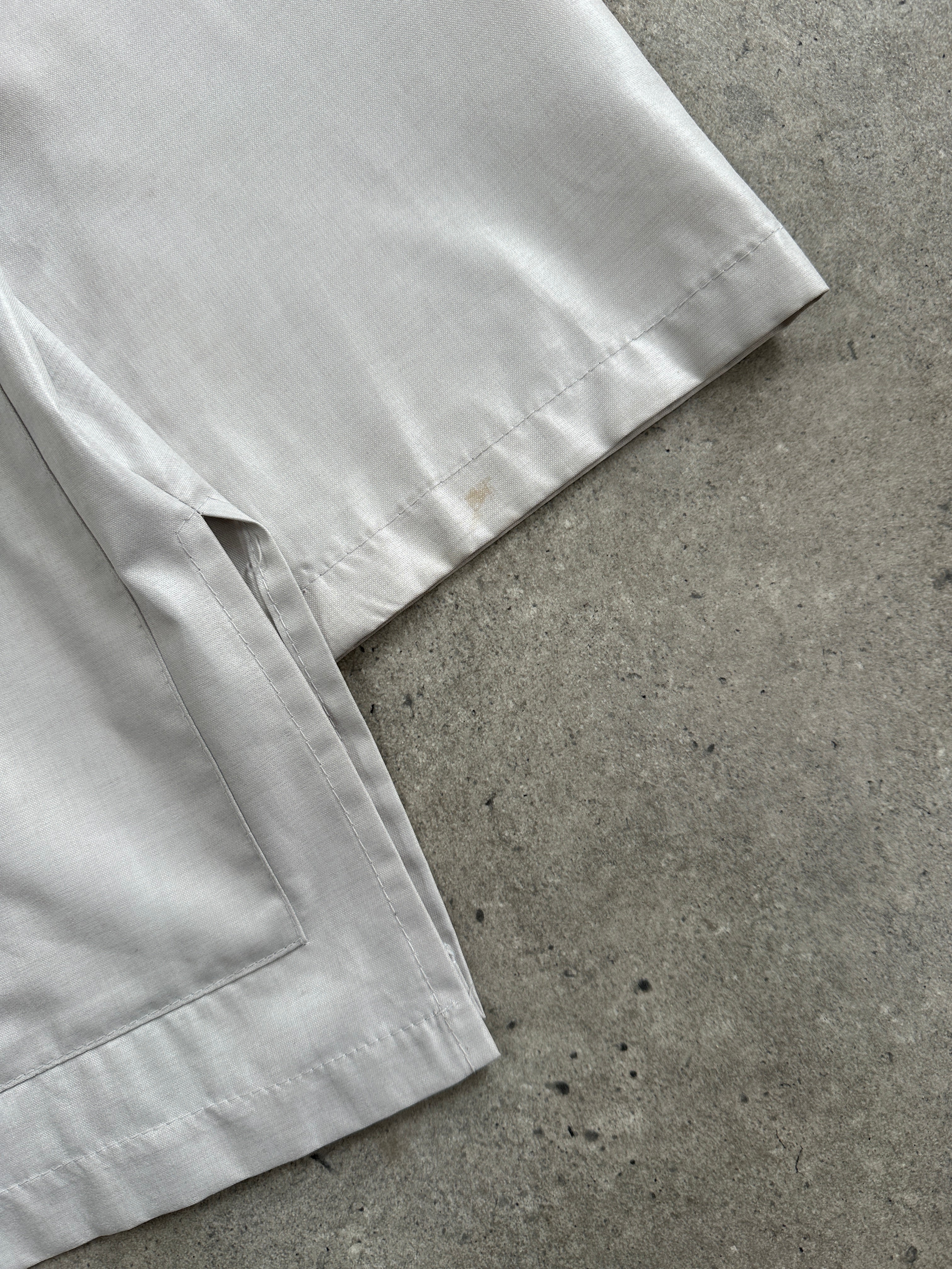 Italian vintage 1990s lightweight unlined jacket in size large, showcasing classic design and soft fabric details.