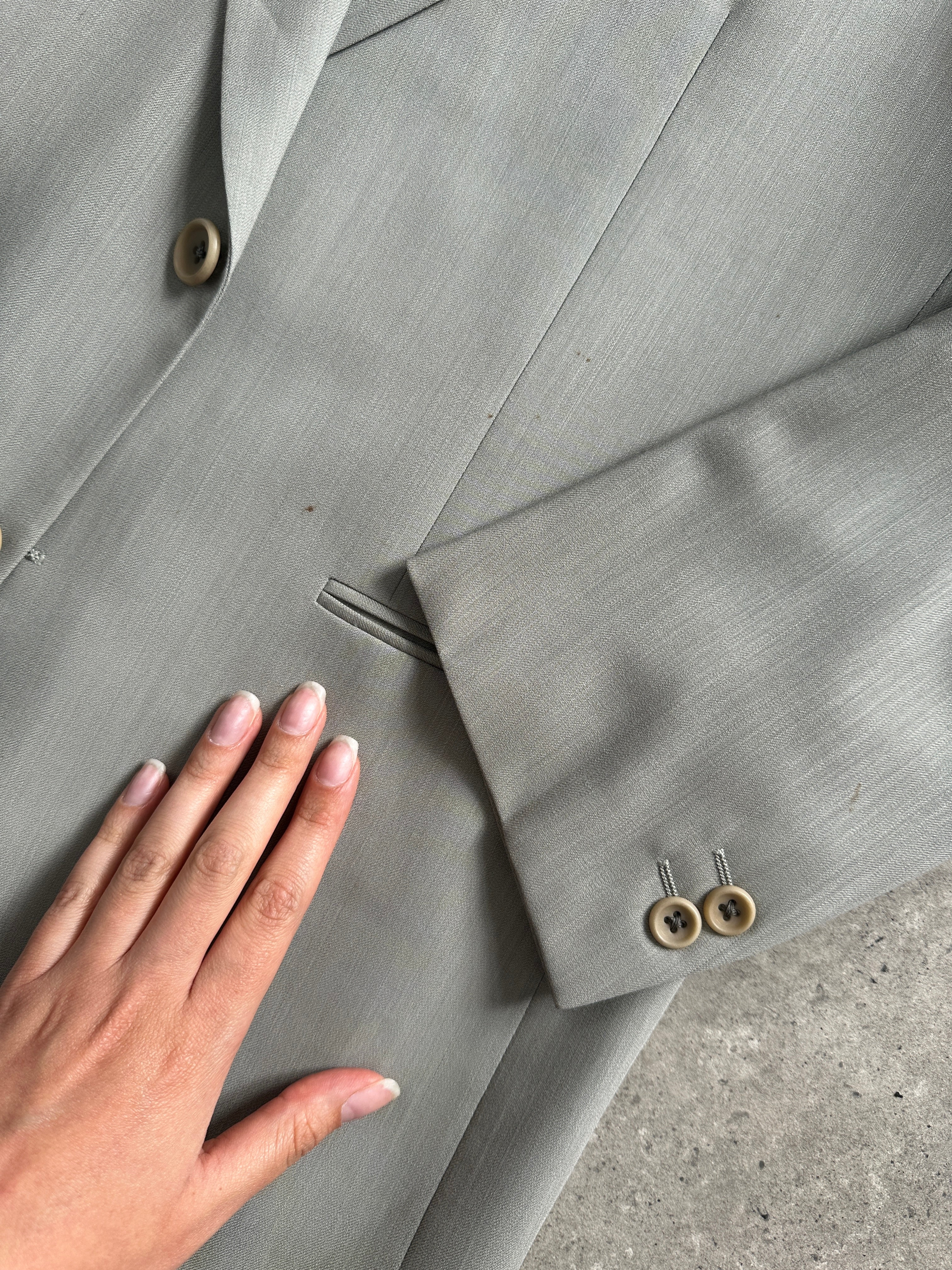 Vintage Italian vintage wool jumpsuit, single-breasted suit in size 38R/W30, featuring classic tailored design and neutral fabric.