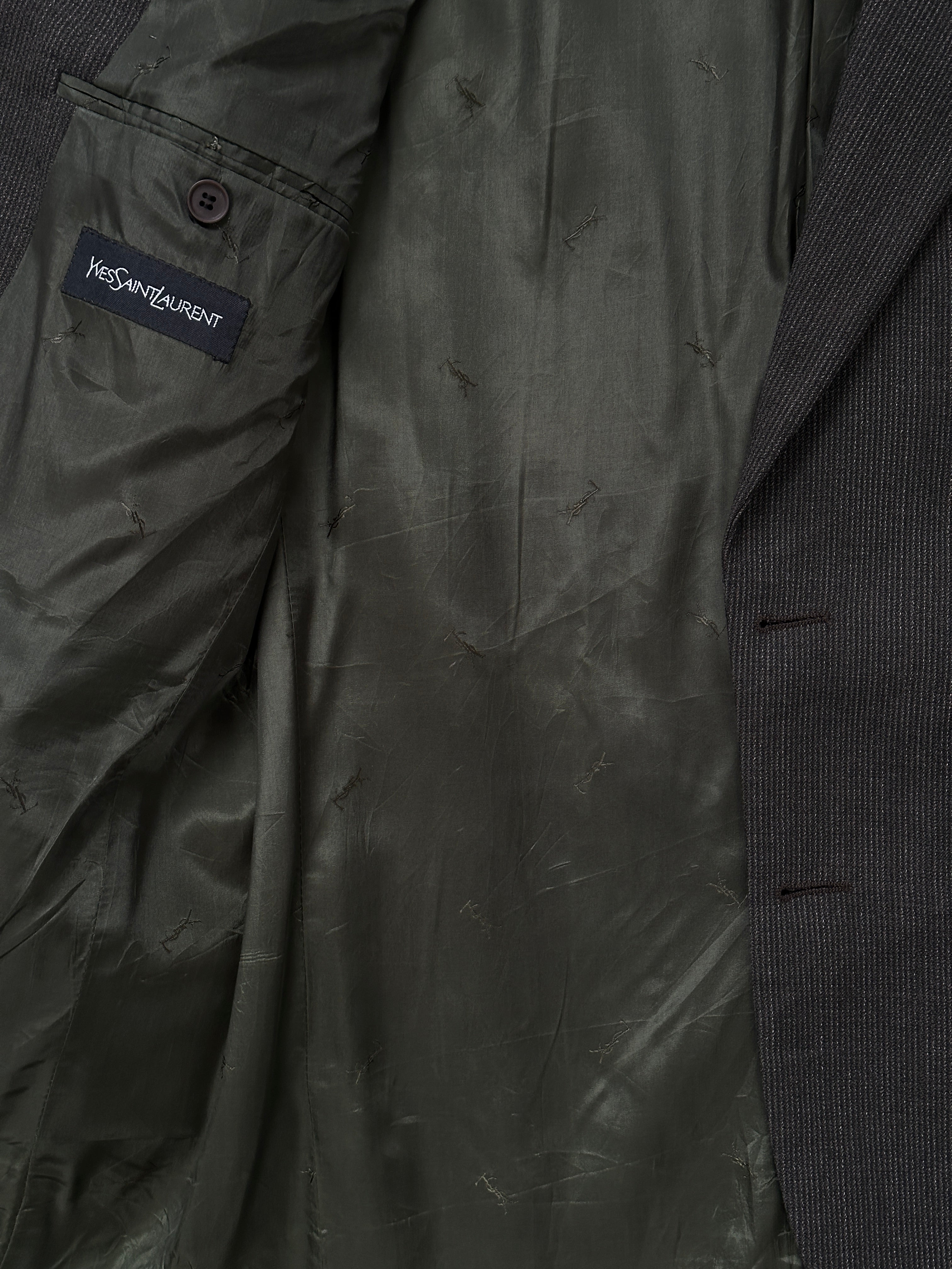 Yves Saint Laurent 1990s pure wool single-breasted blazer in size 40R/M, shown on a hanger with classic tailored design.