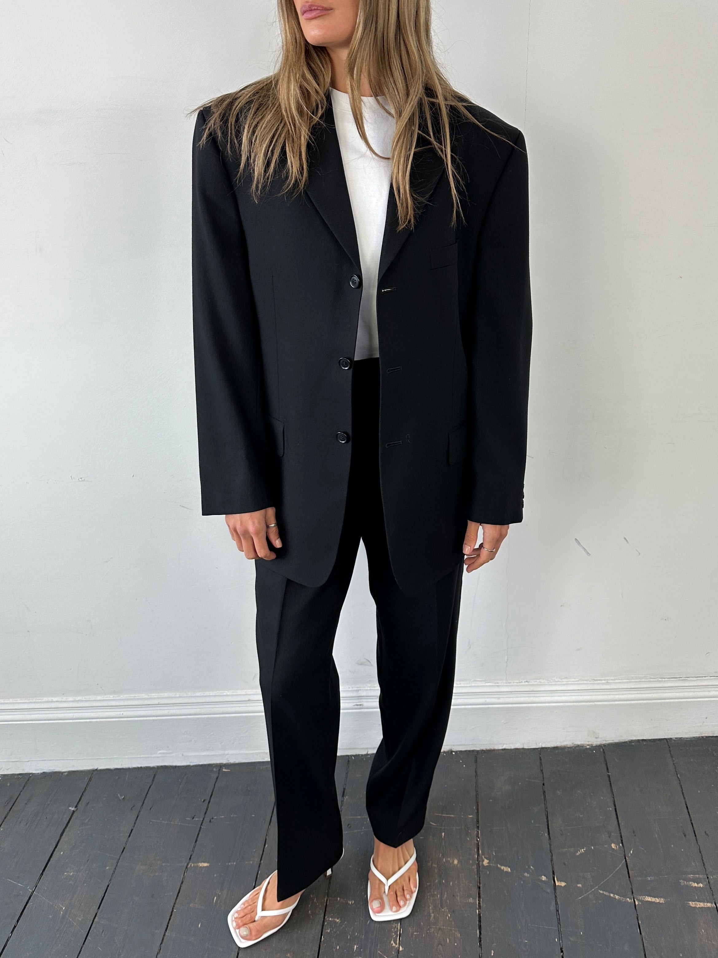 Pierre Cardin pure wool single-breasted suit jumpsuit, size 40R/W34, tailored fit with lapel collar and front button closure.
