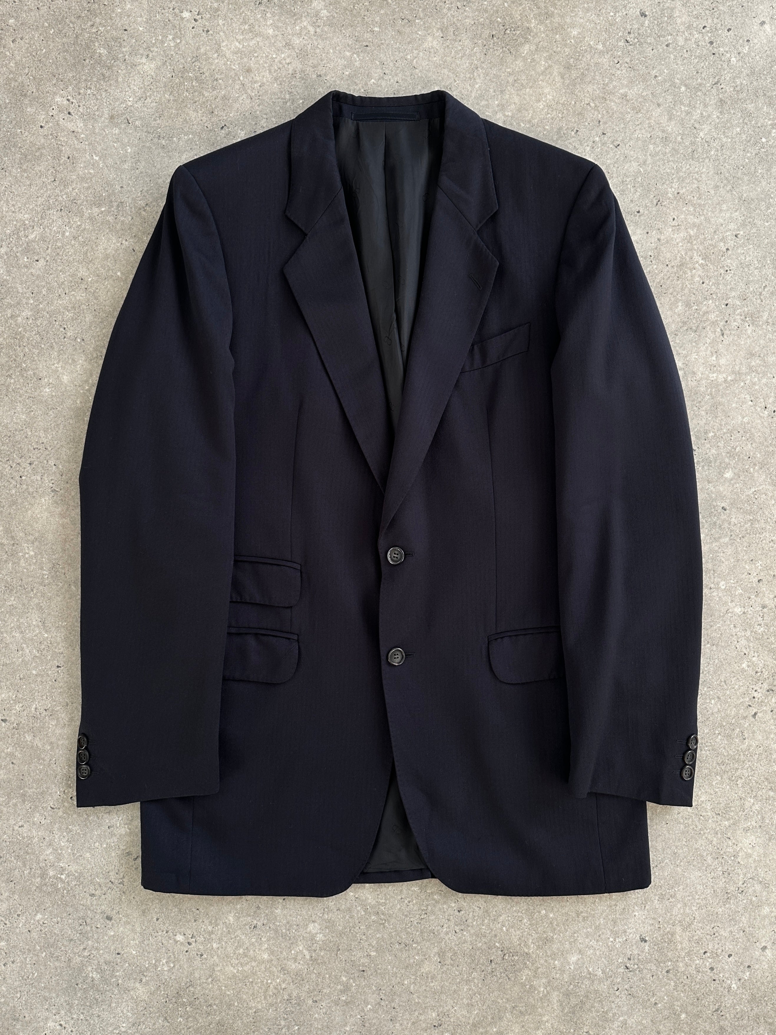 Christian Dior Monsieur 1990s pure wool blazer in size 40R/L, tailored fit with classic lapel and button closure.