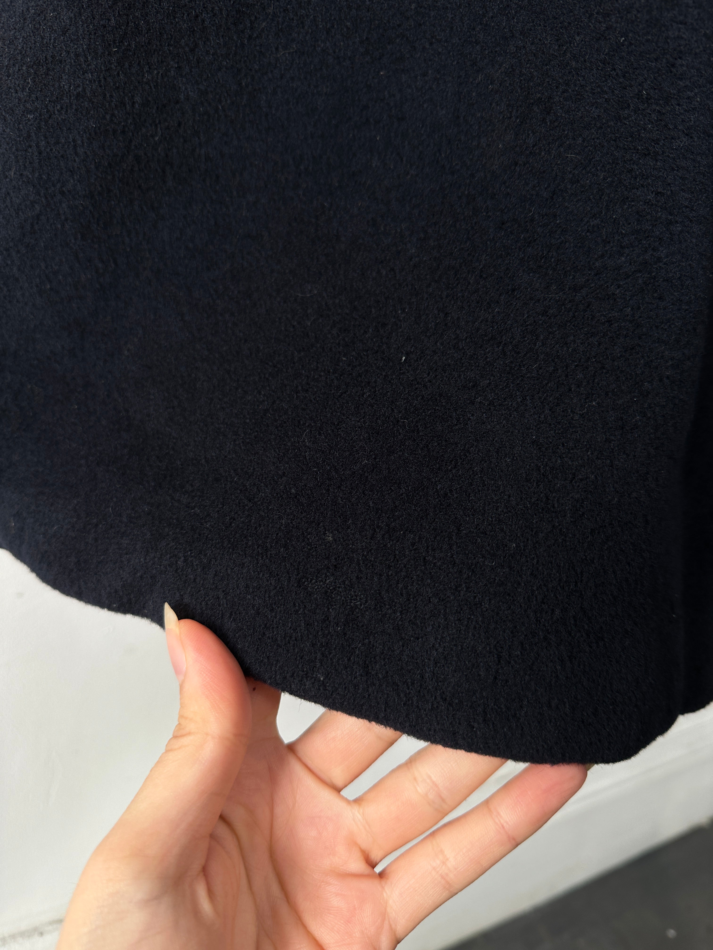 Emporio Armani wool cashmere double-breasted coat in XL/XXL, showcasing a classic tailored design with lapels and button details.