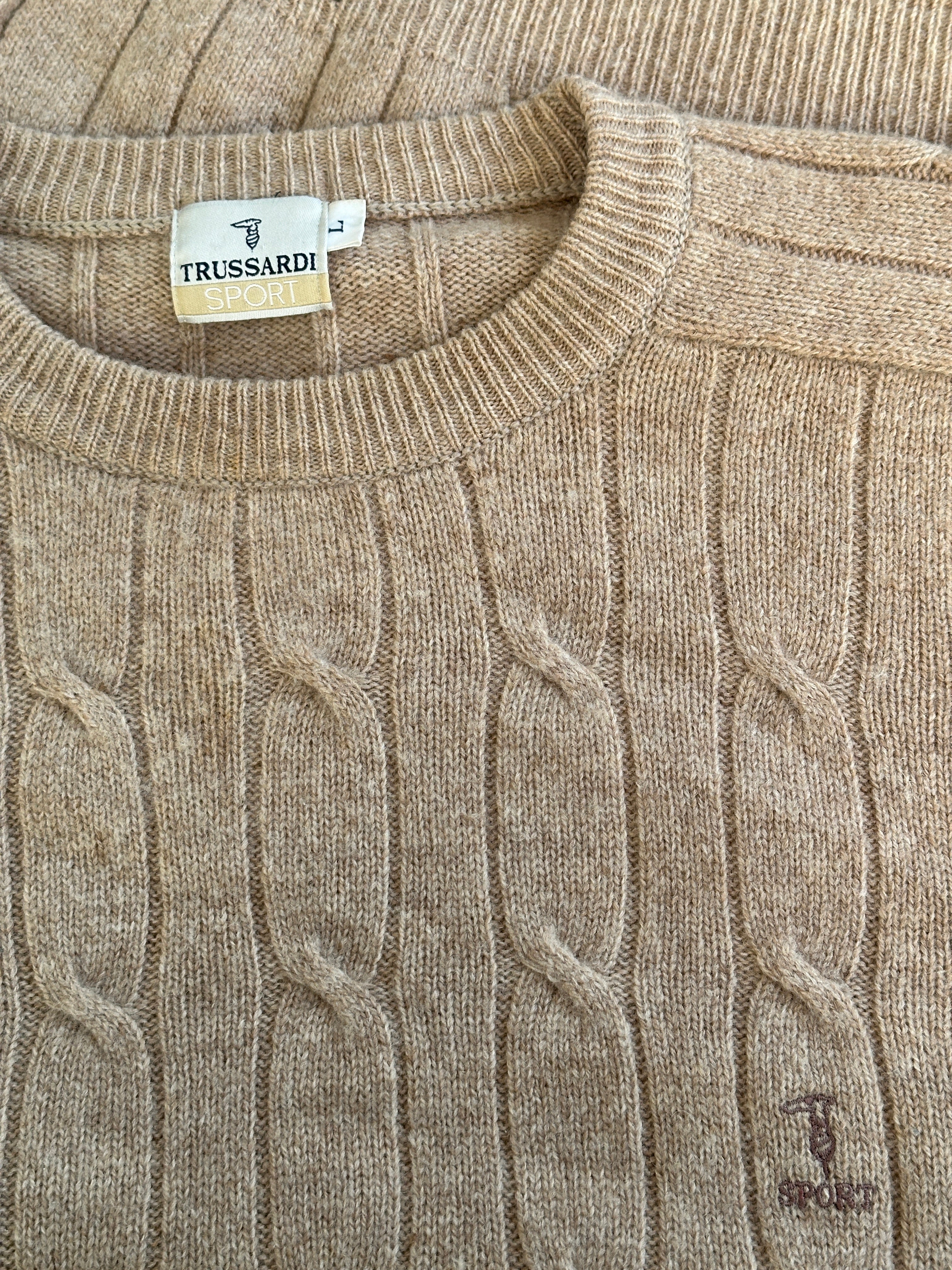 Trussardi pure wool cable knit logo jumper in size L, featuring a textured knit pattern and brand logo detail.