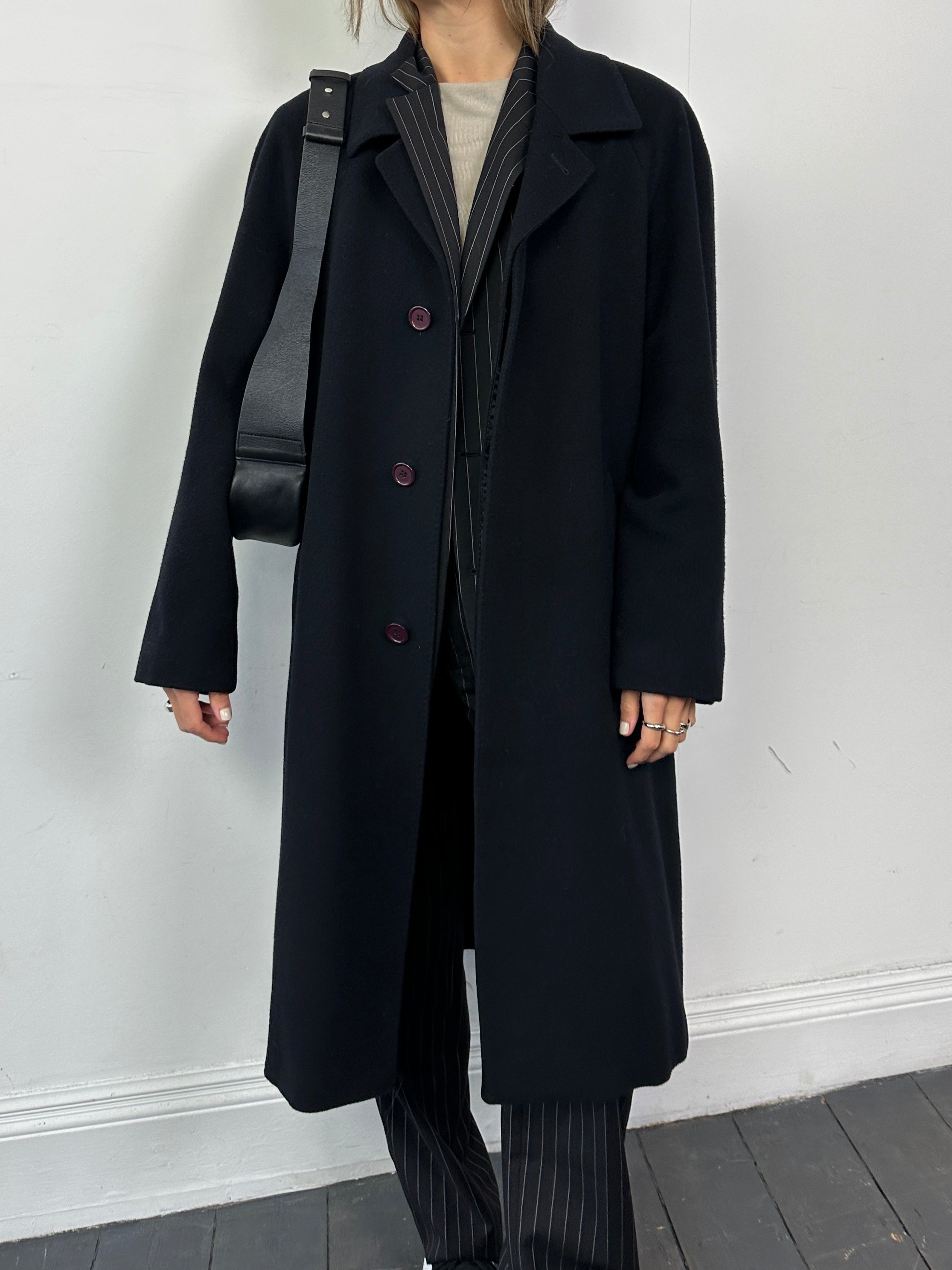 Vintage Italian vintage wool cashmere coat with concealed placket, in size L/XL, stylish and warm outerwear for cold weather.