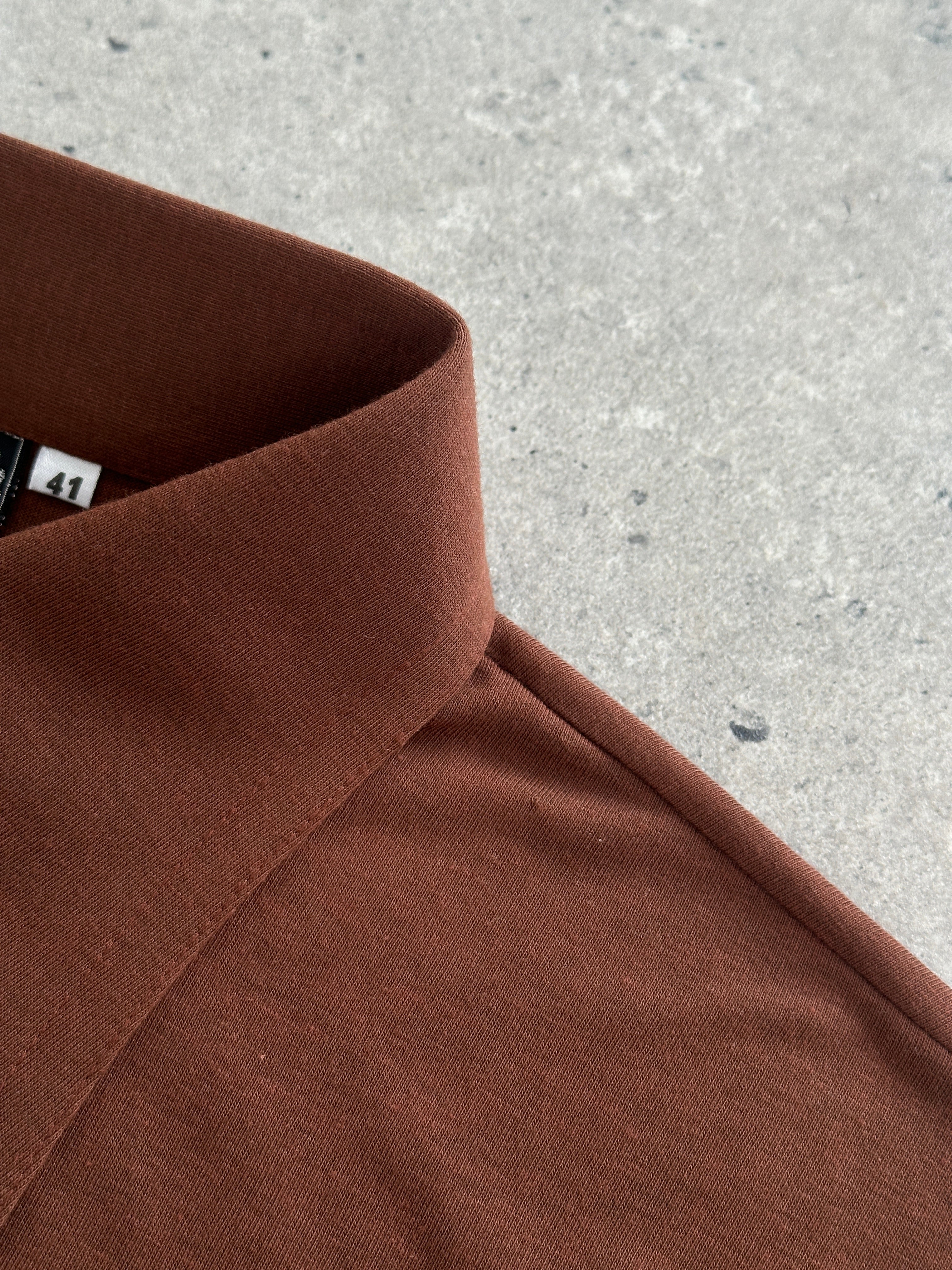 Vintage Italian 1970s dagger collar polo shirt, size M, featuring classic retro style and short sleeves.