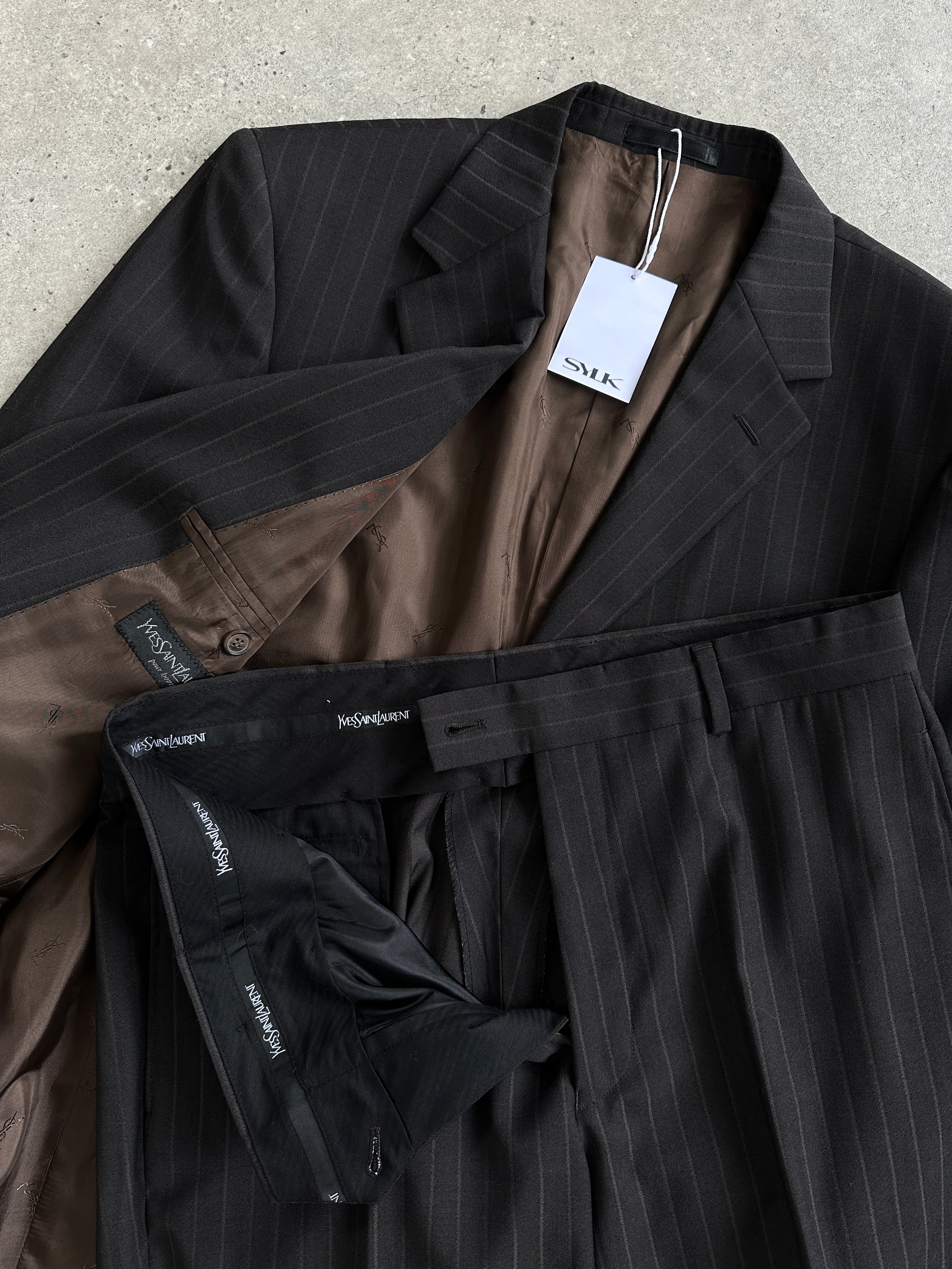 Yves Saint Laurent Pour Homme pinstripe pure wool single-breasted suit in size 40R/W32, displayed on a hanger.