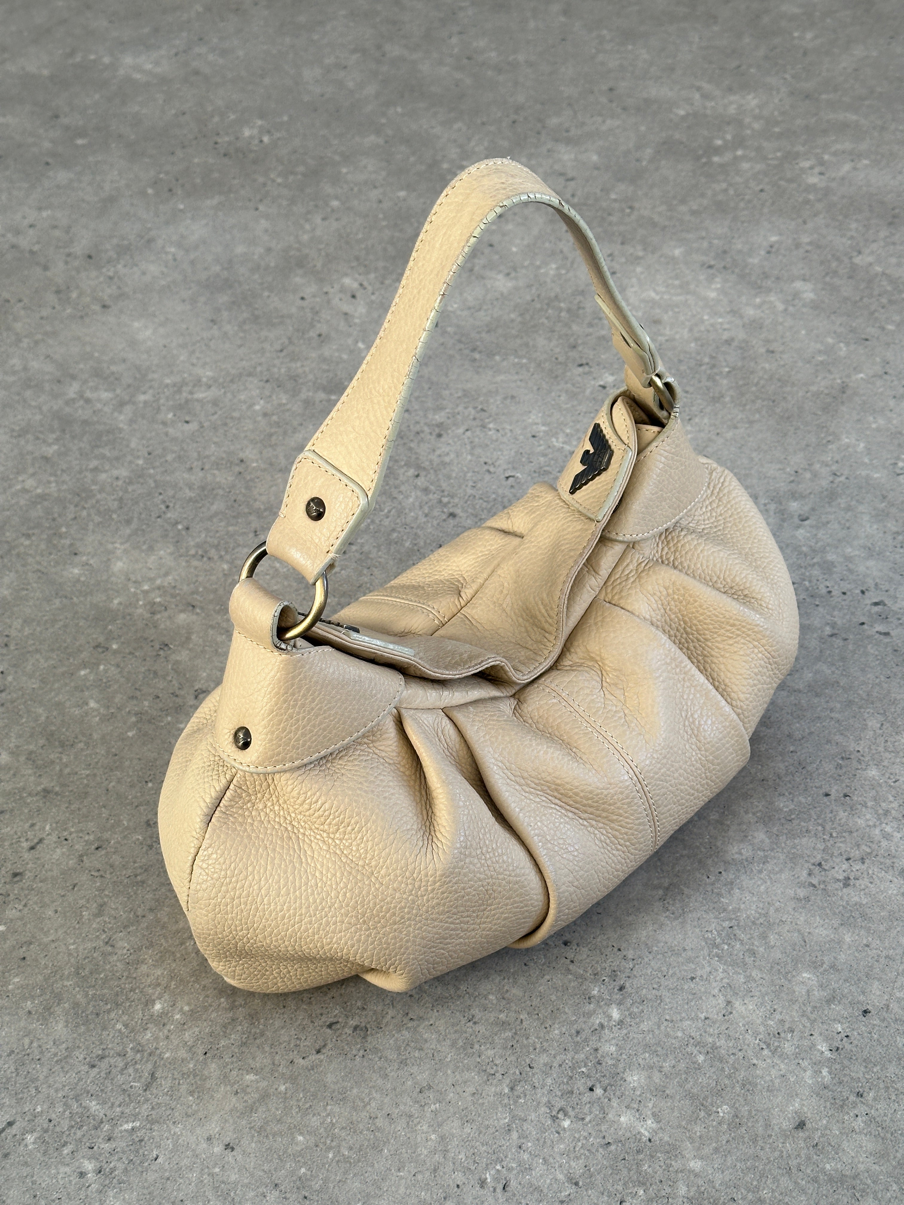 Emporio Armani leather pleated shoulder bag from the 2000s with a sleek, structured design and elegant leather finish.