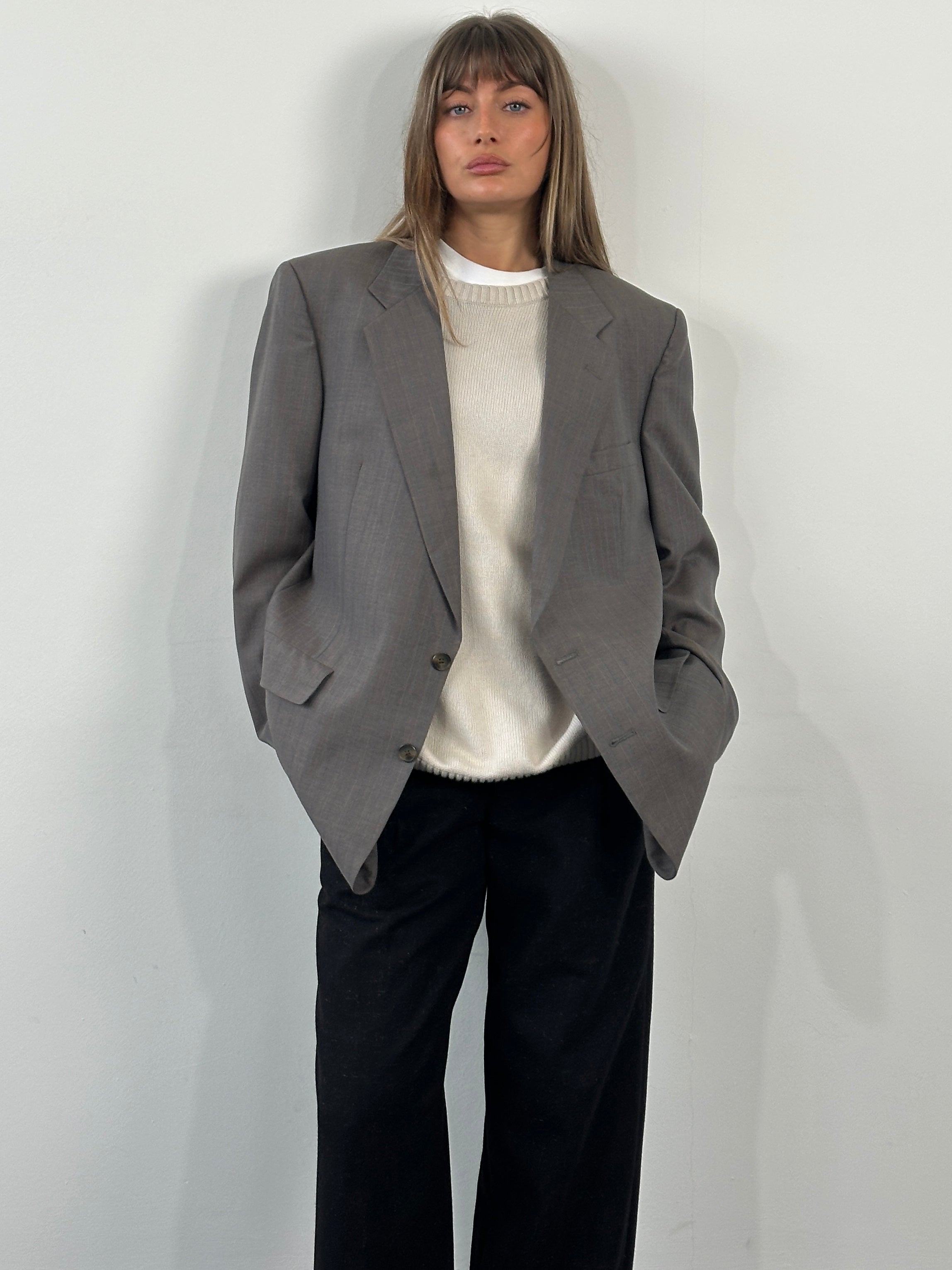 Christian Dior Monsieur 1990s stripe single-breasted blazer in size 44R/XL, featuring classic tailored design and bold stripe pattern.