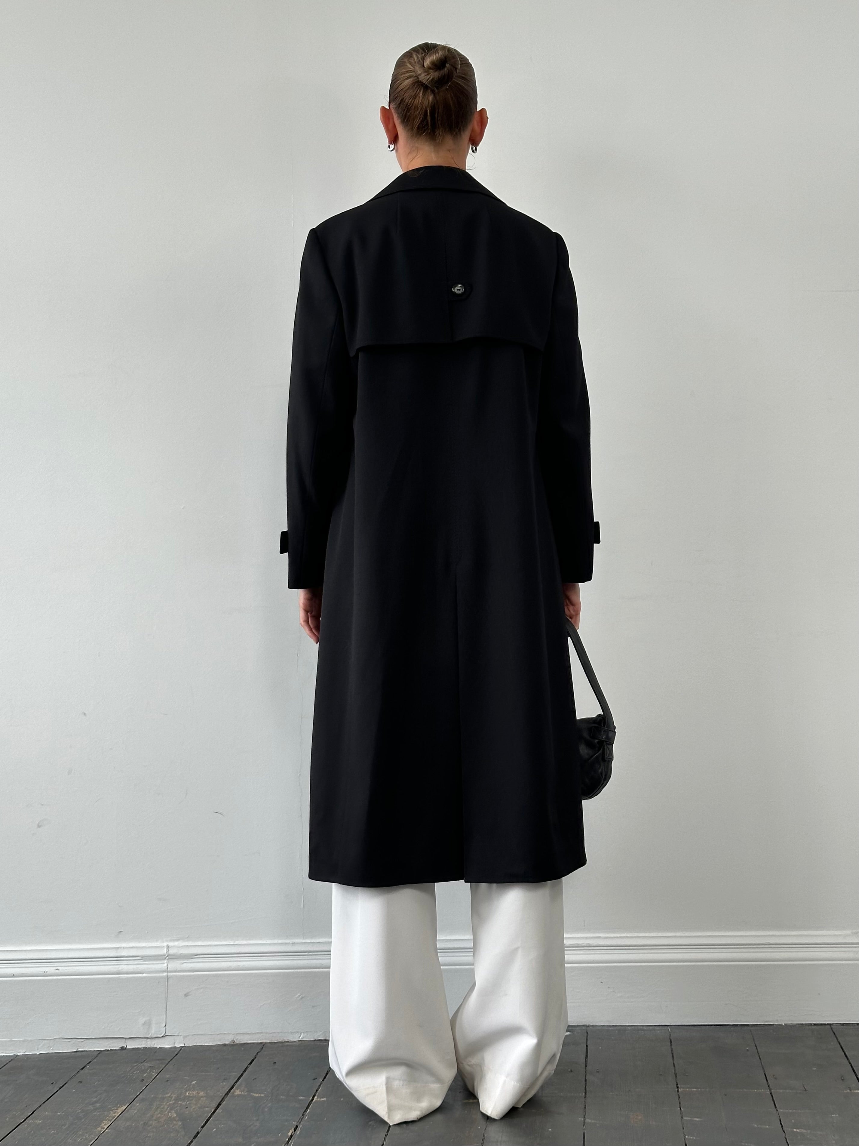 Vintage pure wool single-breasted belted trench coat, medium size, shown in classic beige with lapels and button details.