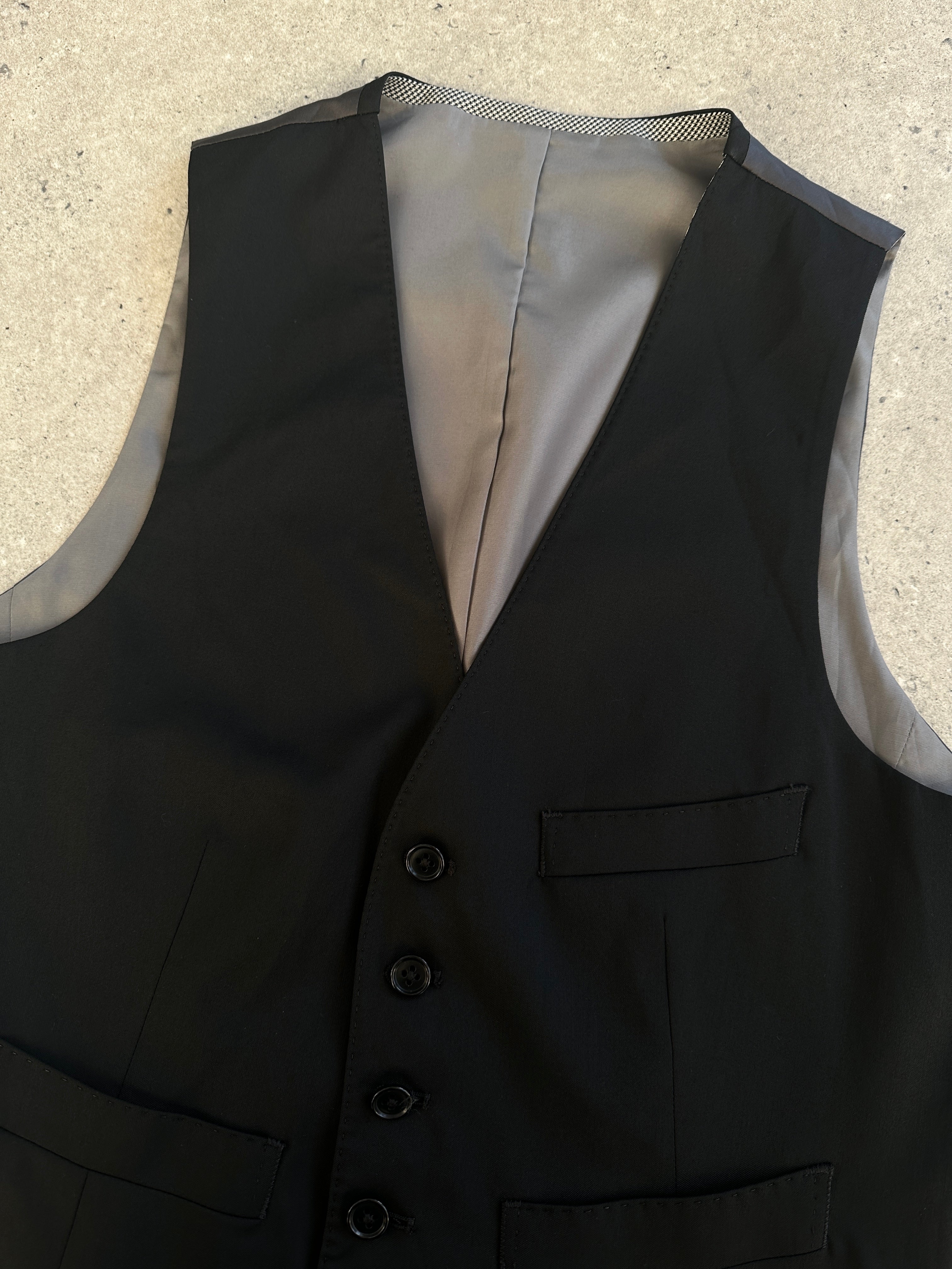 Vintage reversible wool waistcoat in size M, tailored fit with classic design, shown in a front view image.