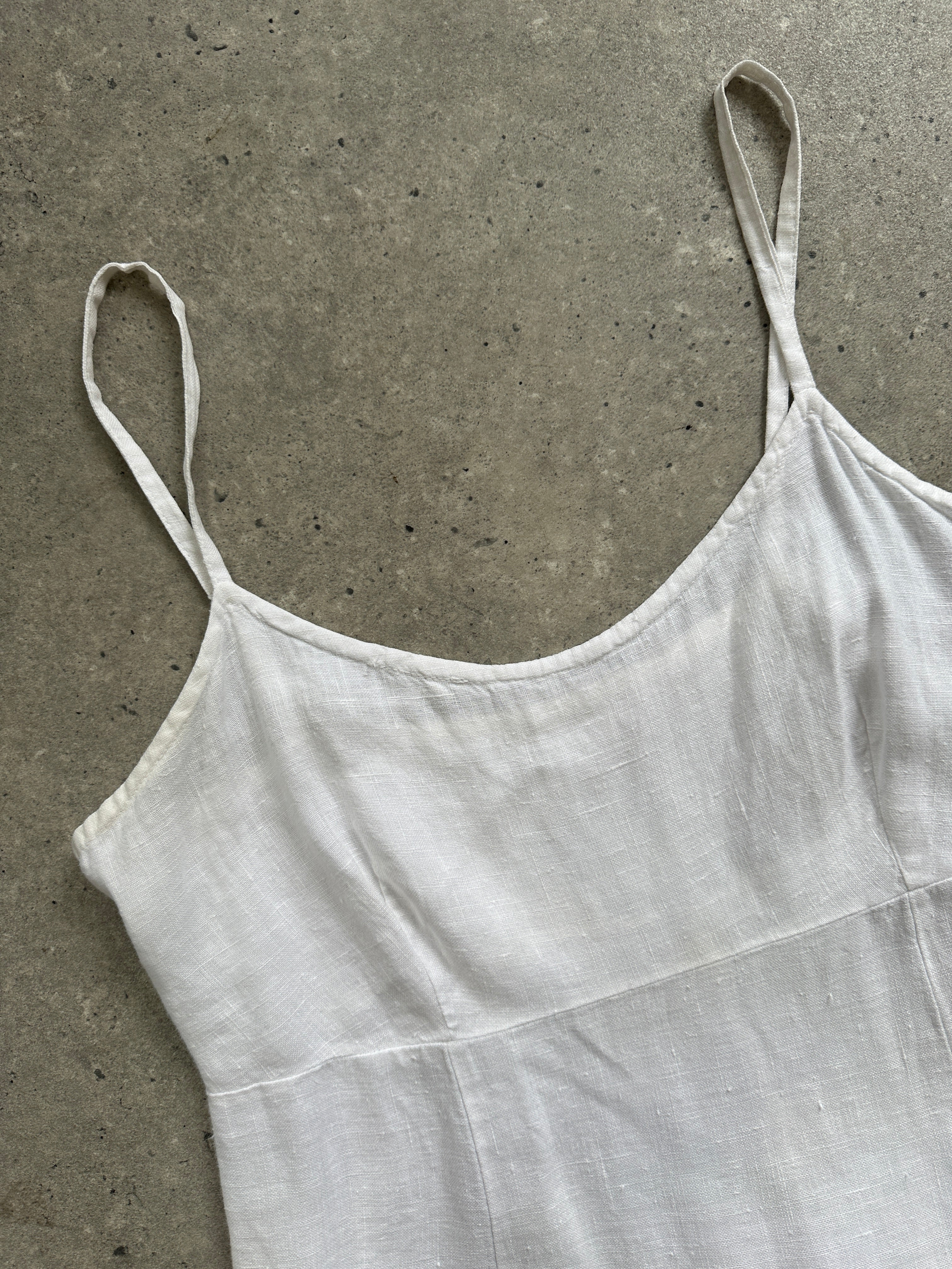 Vintage Italian vintage pure linen floor-length slip dress in S/M, showcasing a flowing, elegant design with natural linen fabric.