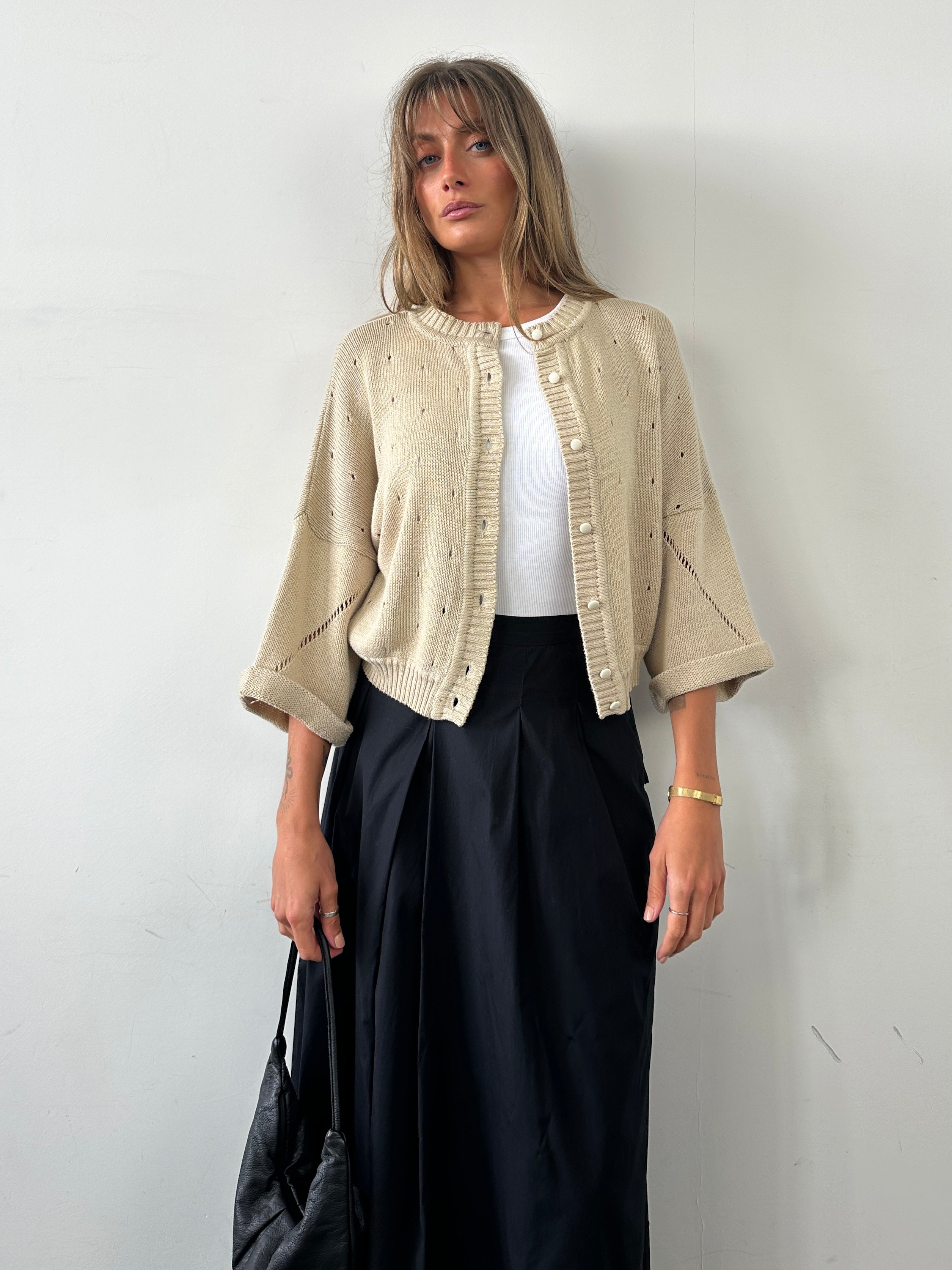 Vintage Italian vintage pure cotton cardigan in size M, featuring classic knit design and button closure.