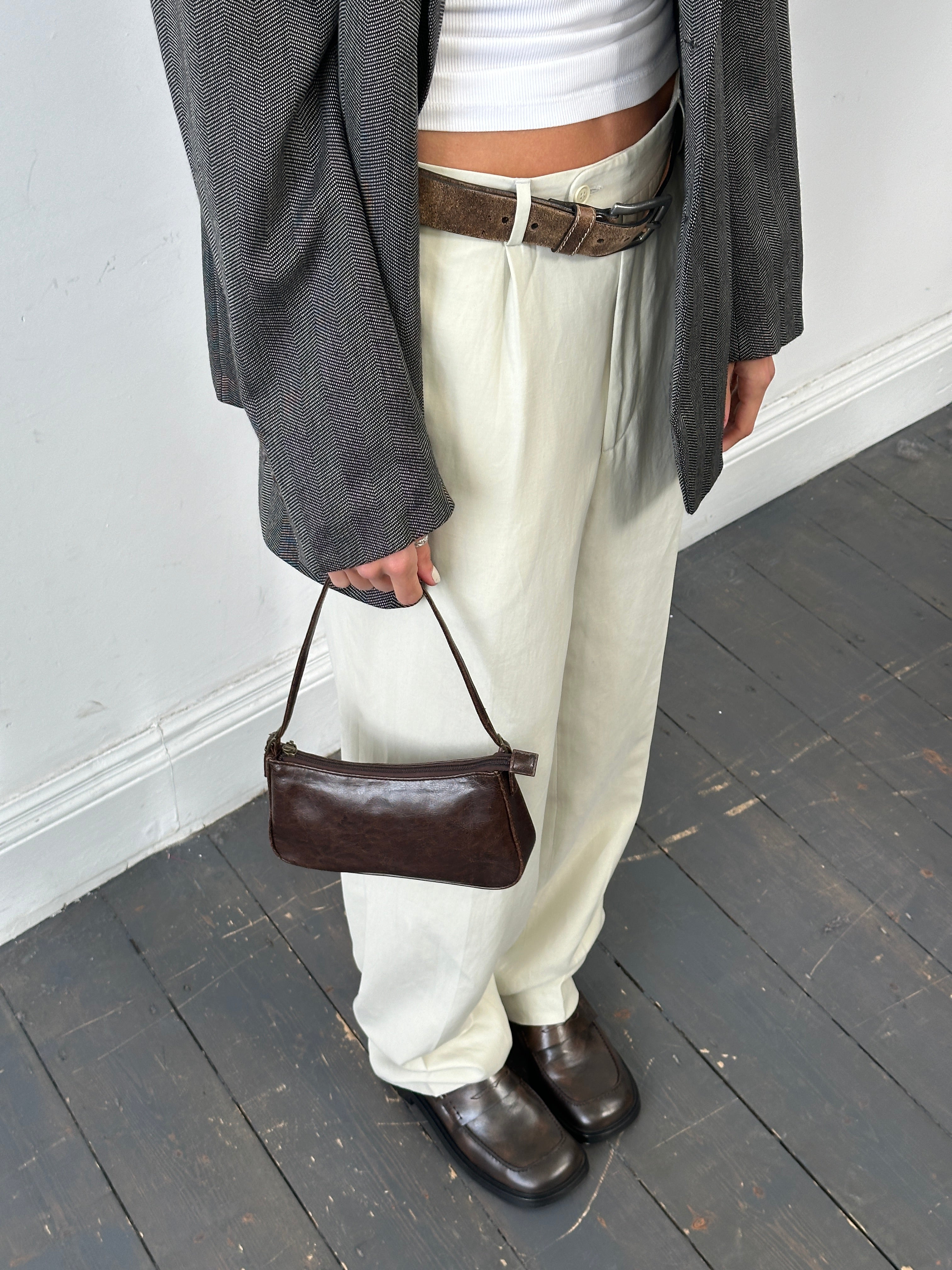 Vintage faux leather shoulder bag featuring a classic design with sturdy straps and a spacious interior for everyday use.