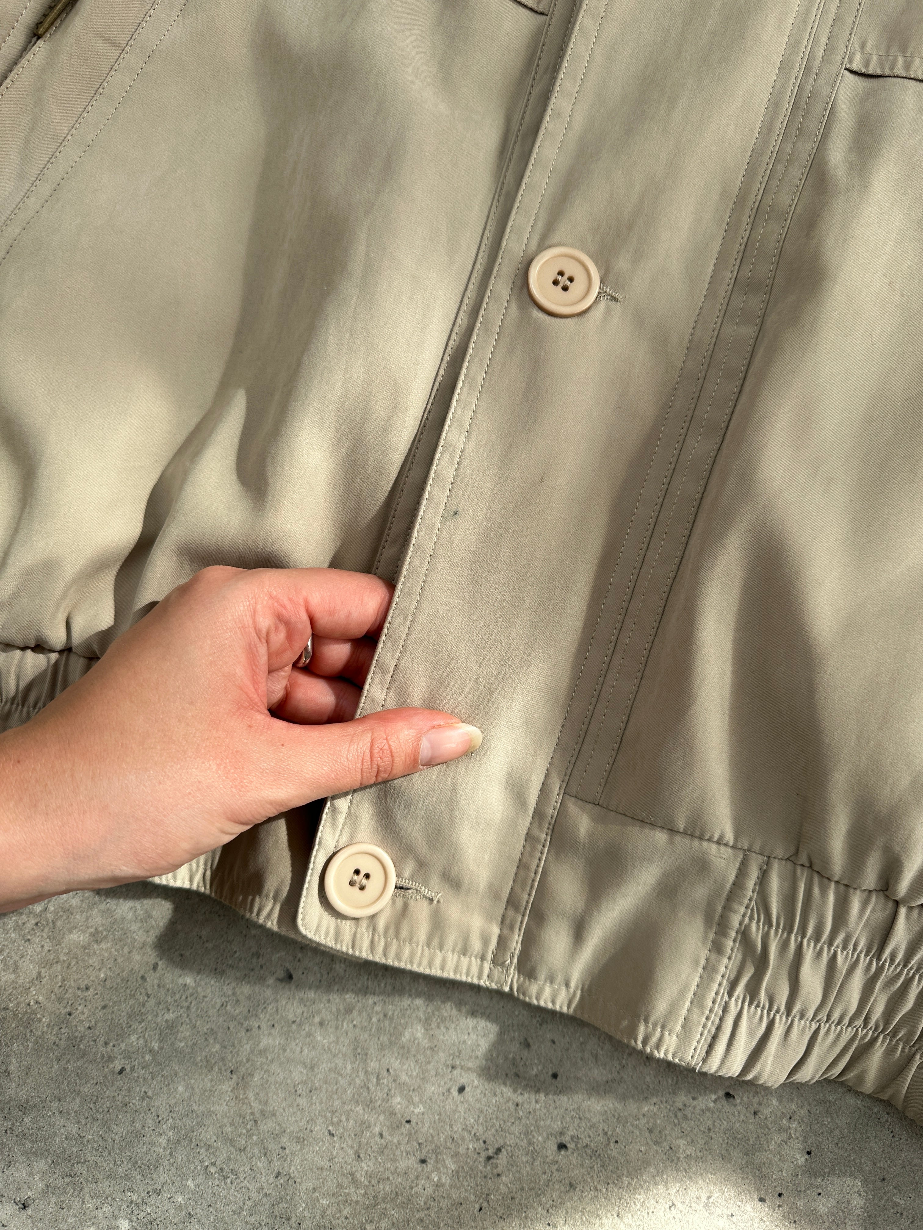 Vintage Micro Satin Bomber Jacket in XXL, showcasing shiny satin fabric, ribbed cuffs, and classic bomber style.
