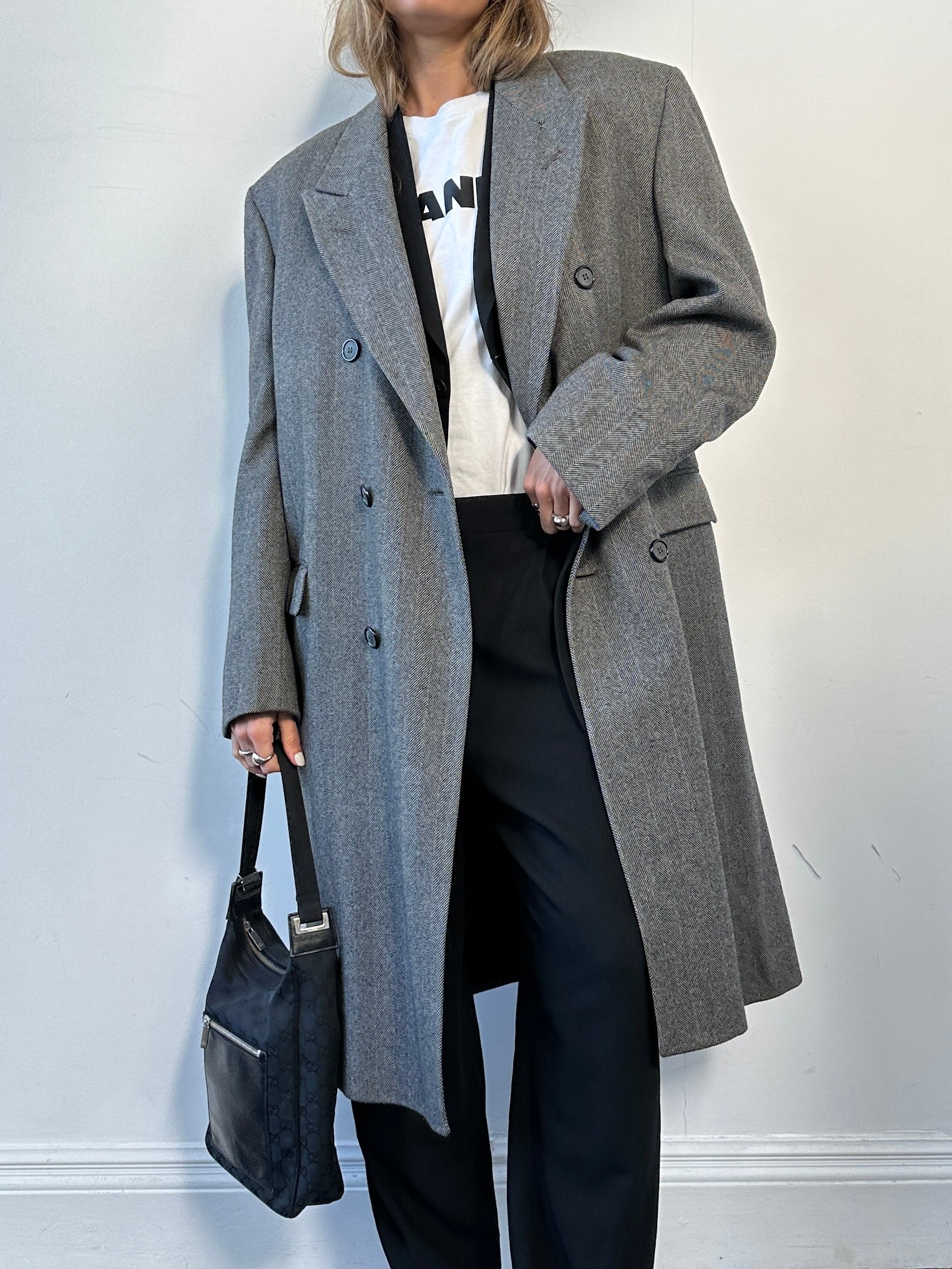 Vintage British double-breasted wool coat with herringbone pattern, size large/extra-large, stylish and timeless outerwear.