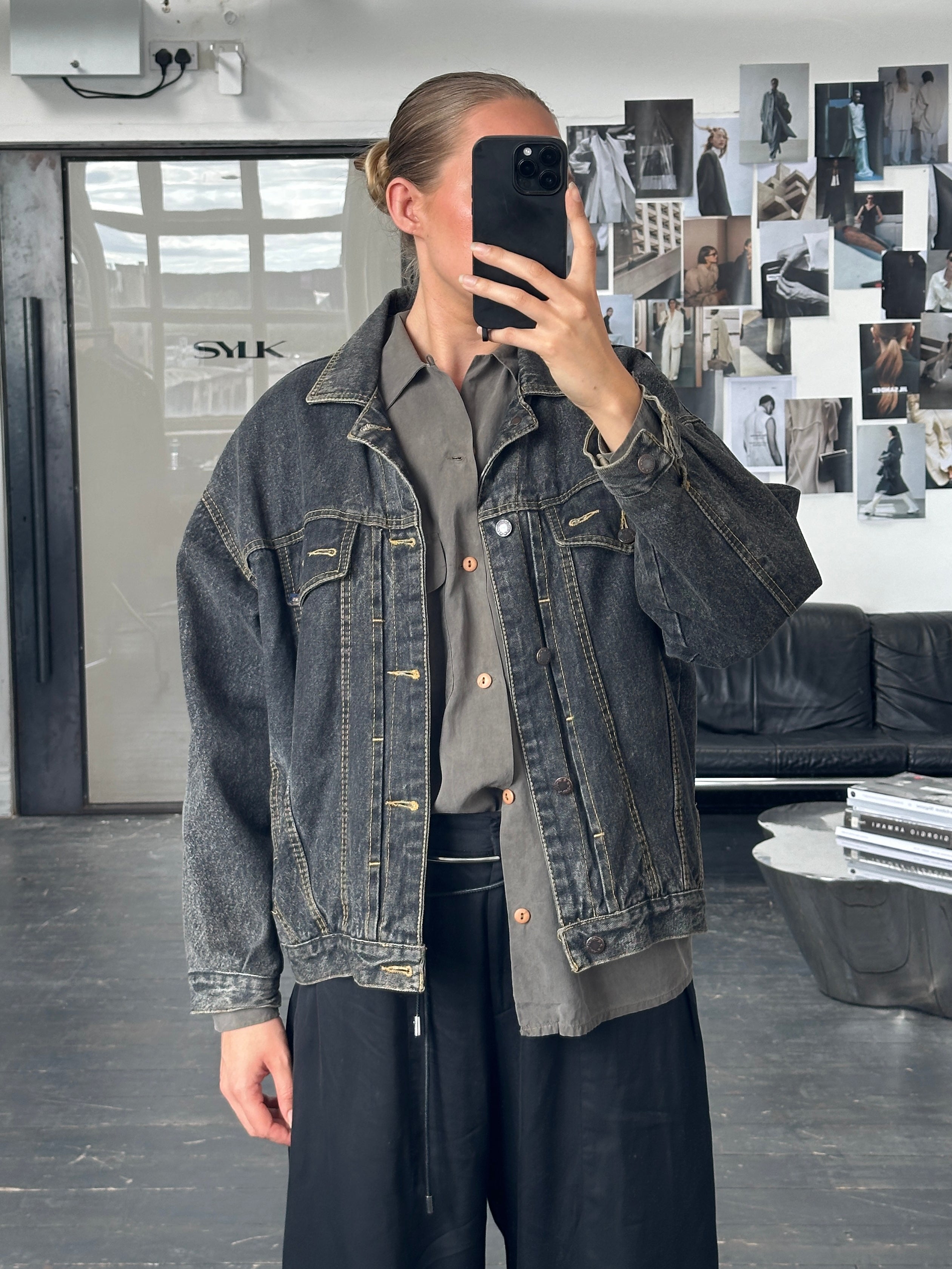 Vintage 1990s boxy denim jacket with classic wash and metal button details, size M, casual and timeless style.