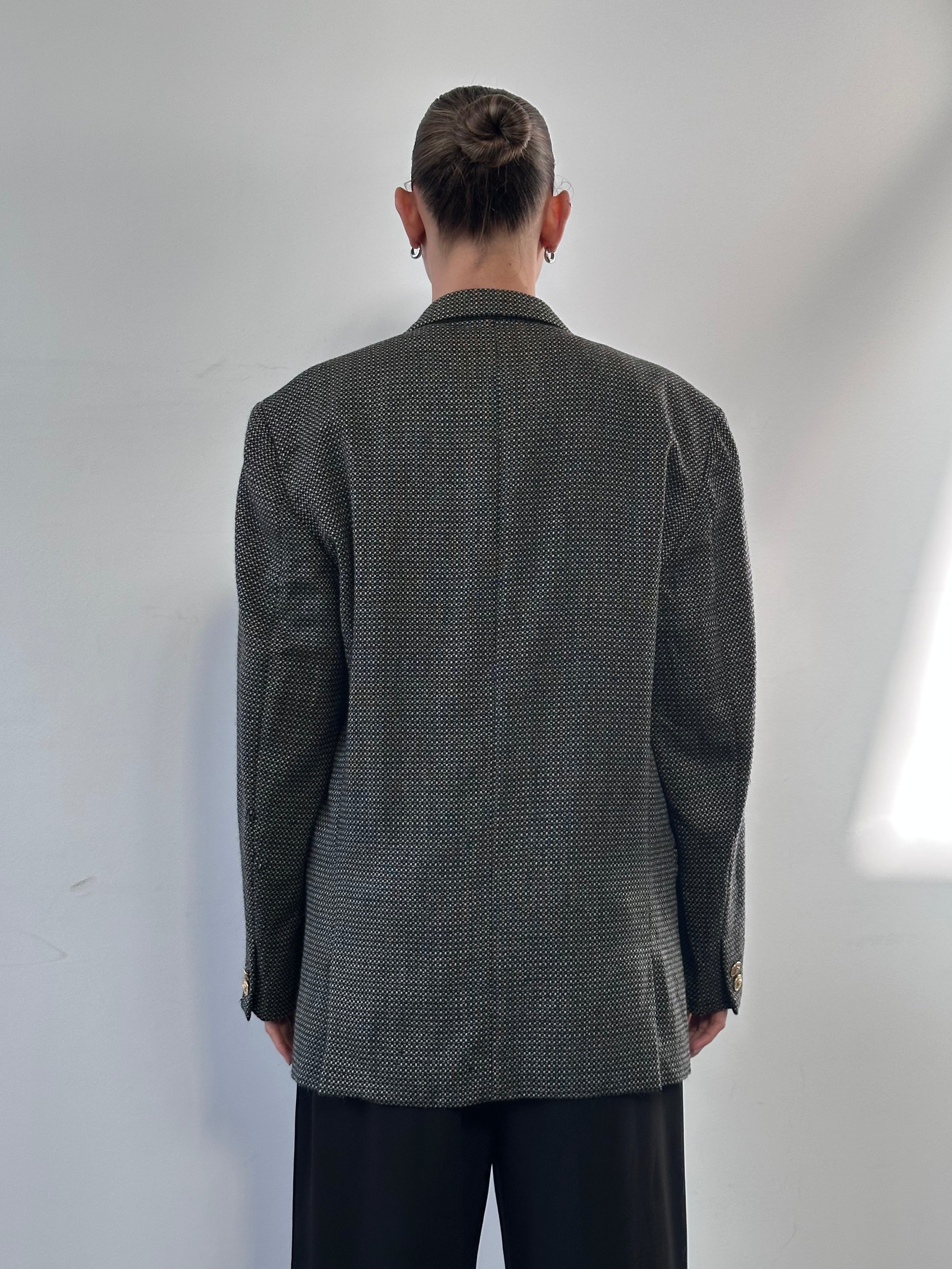 Gianni Versace Versus 90s pure wool single-breasted blazer in size 40R/L, navy blue with classic lapel and tailored fit.