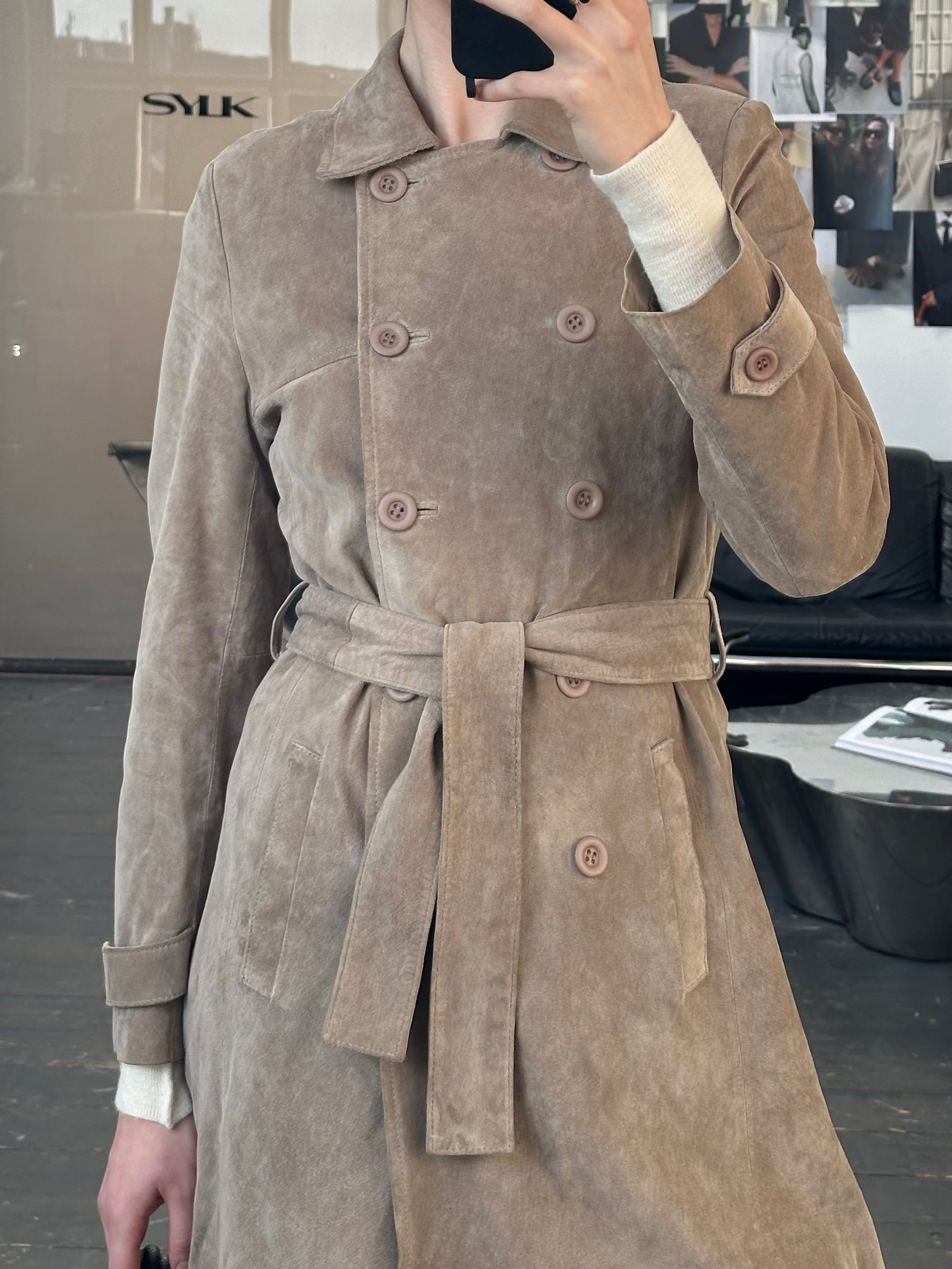Vintage 1990s suede double-breasted belted trench coat in size small, featuring classic design and rich brown suede fabric.