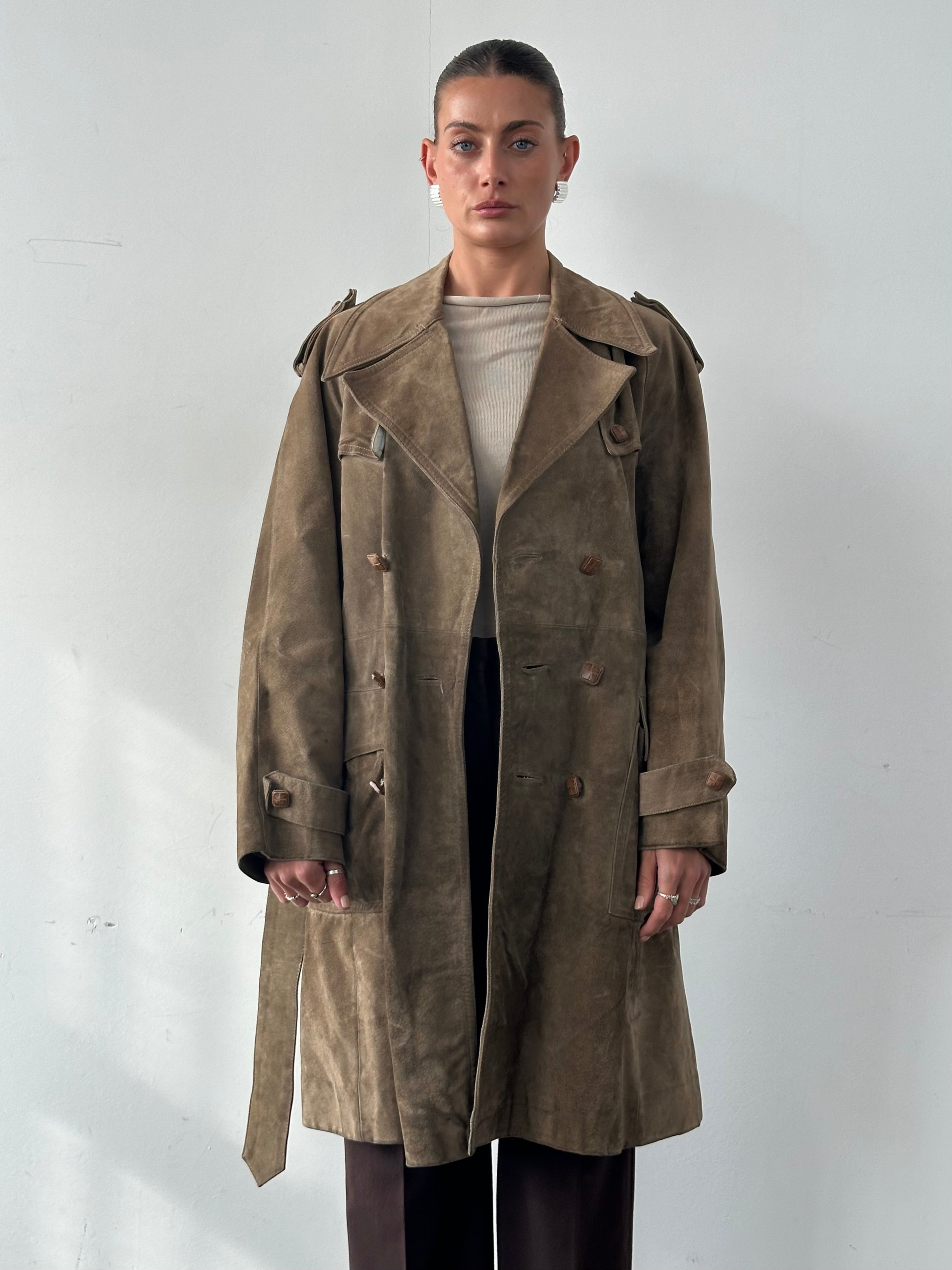 Vintage pure suede belted trench coat in XL, featuring classic design and neutral color, displayed on a hanger.