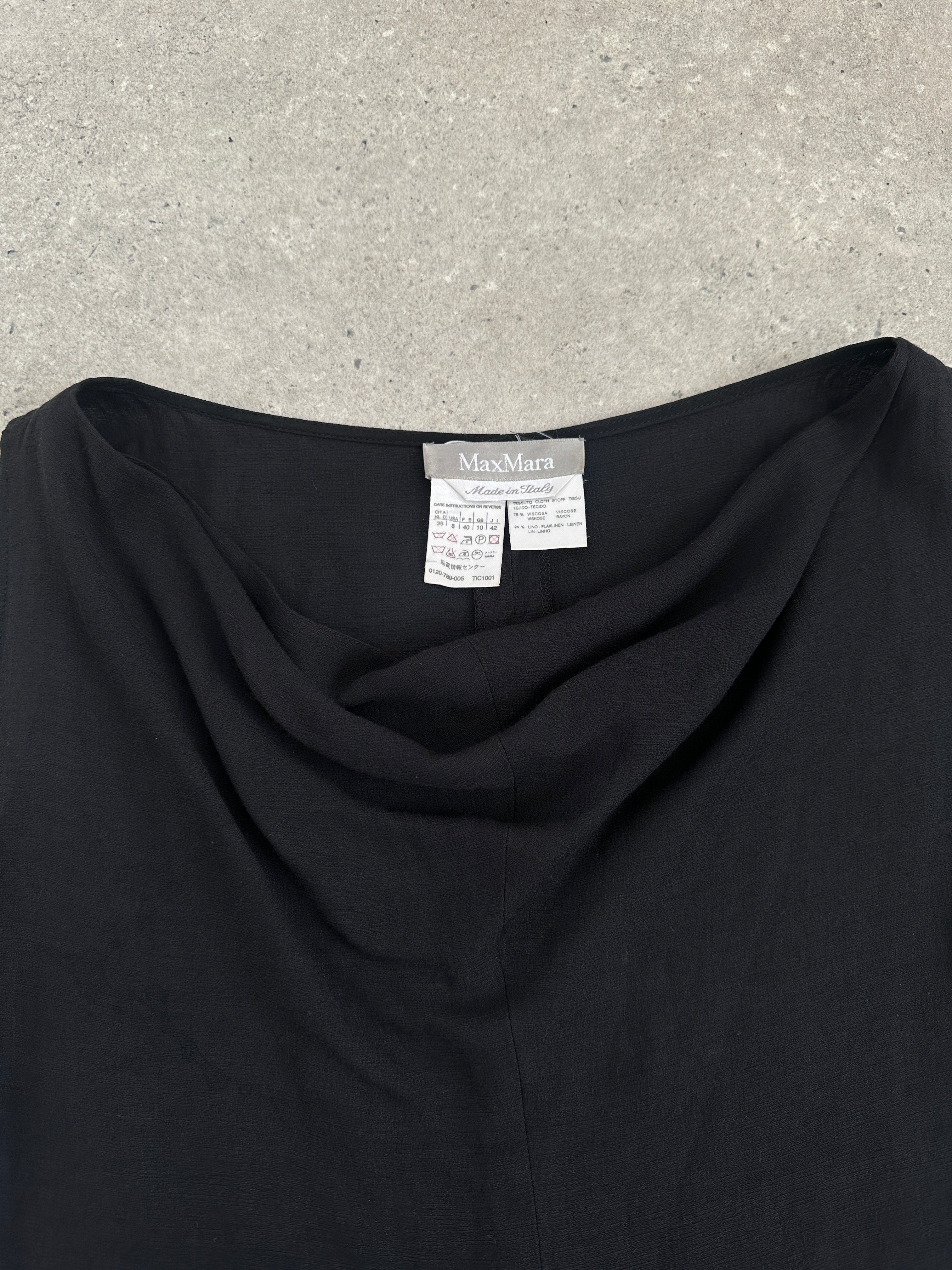 Max Mara linen cowl neck sleeveless tank top in light fabric, shown on a mannequin against a neutral background.