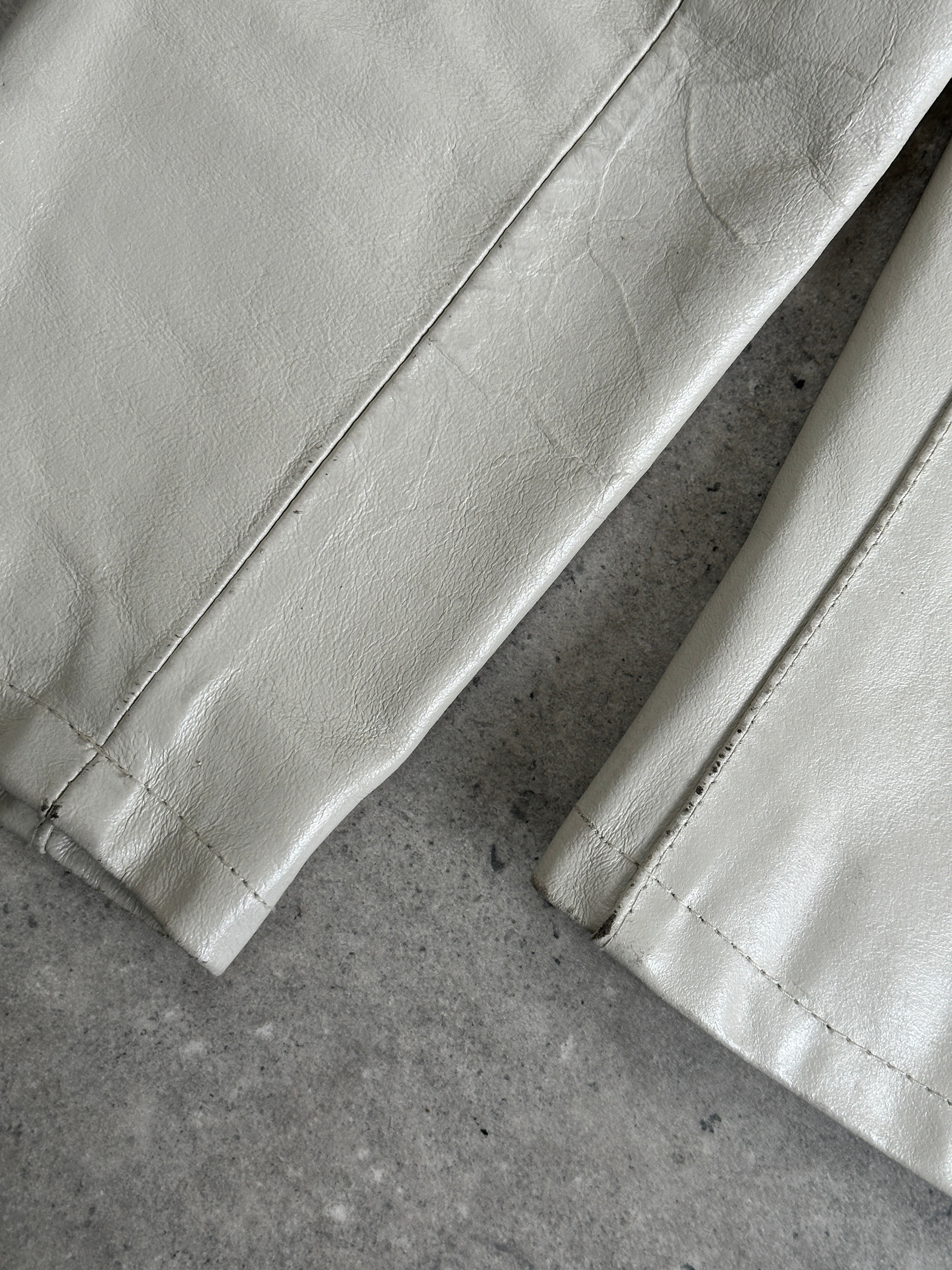 Vintage Italian leather zip-up jacket in size small, stylish vintage leather jacket with classic design and zipper details.