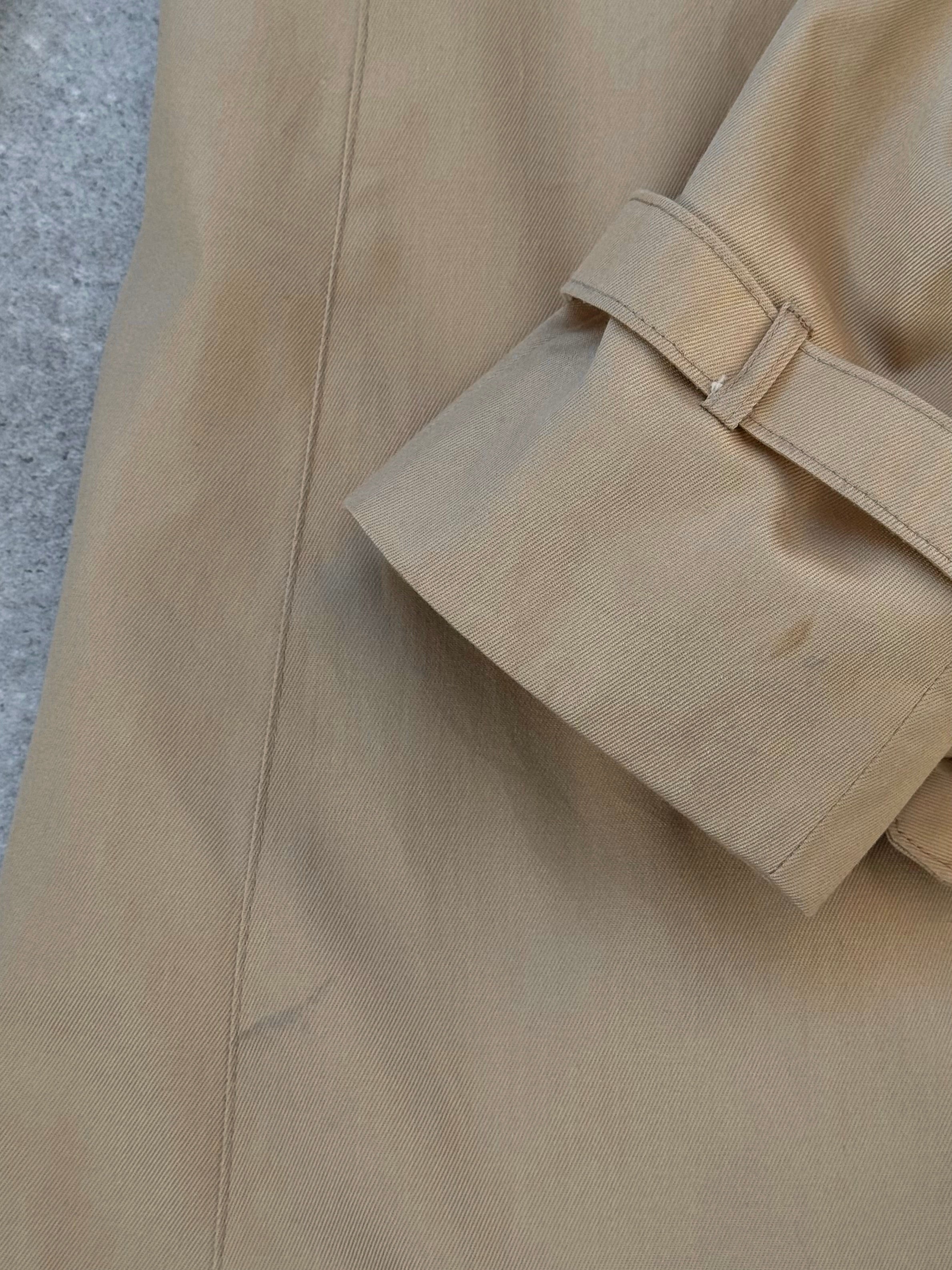 Christian Dior Paris 1980s cotton double-breasted trench coat, size large, shown in beige with classic collar and belt details.