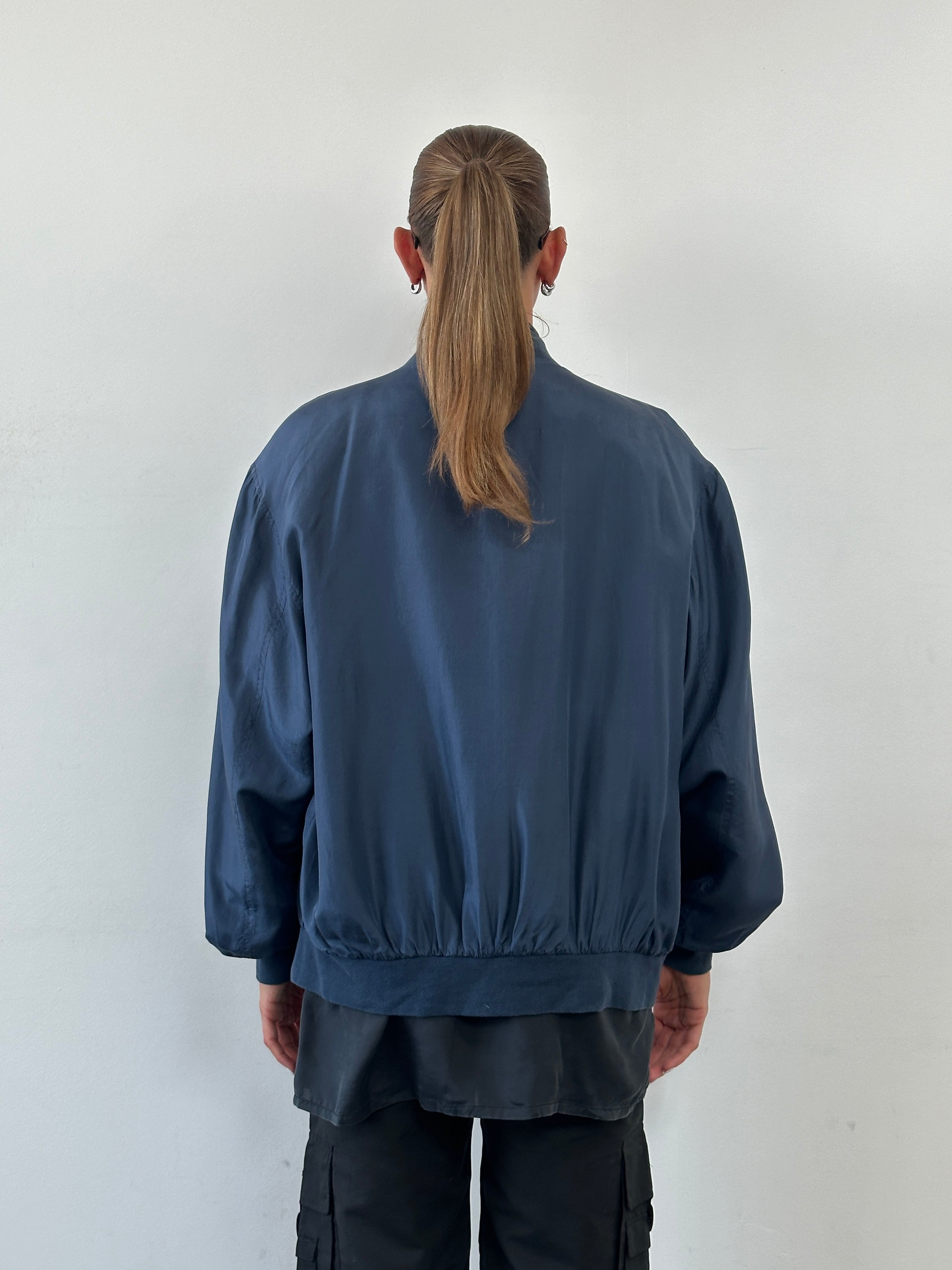 Vintage 90s pure silk bomber jacket in size large, featuring classic design and smooth fabric, by Vintage.