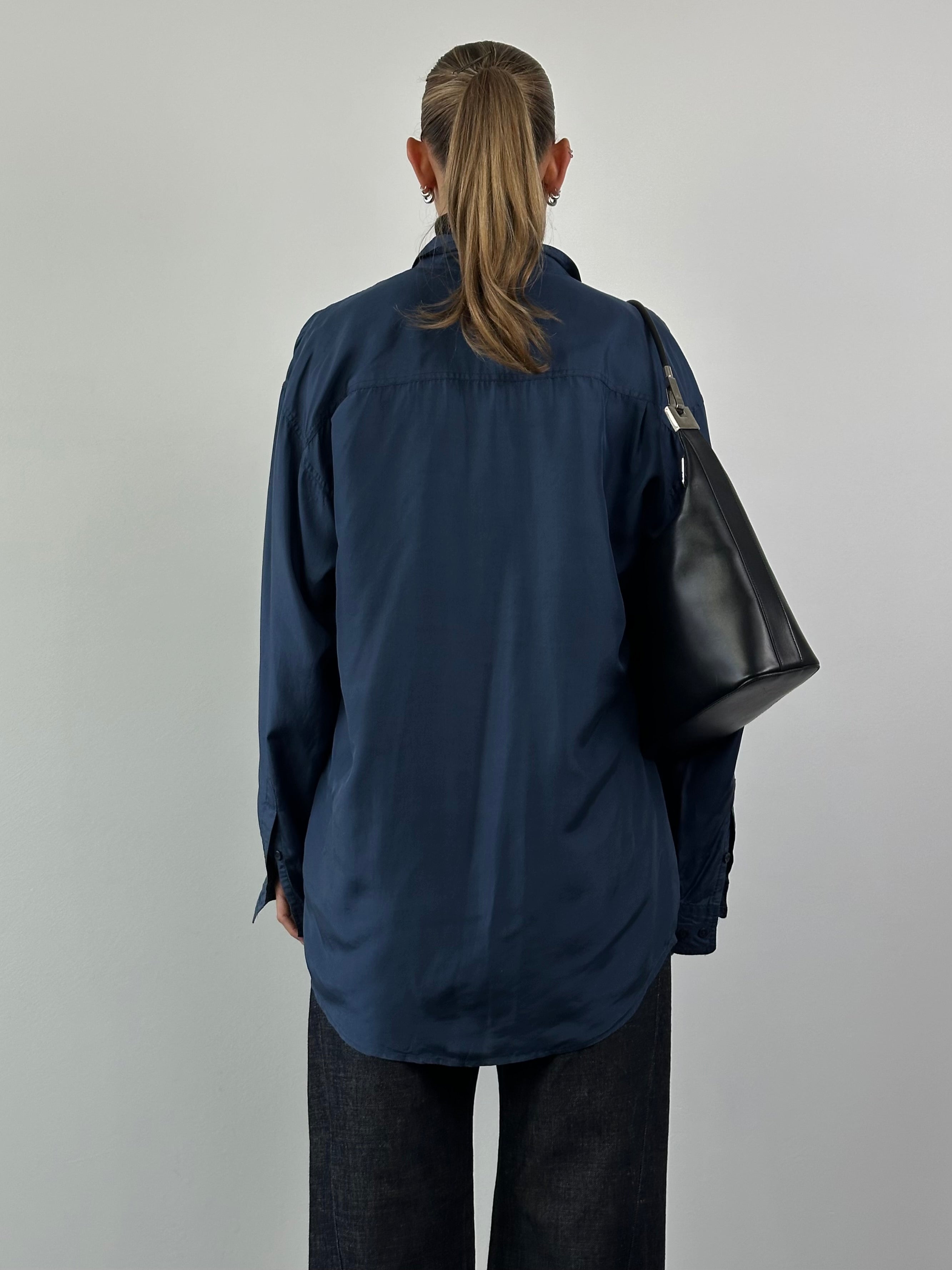 Vintage relaxed pure silk shirt in XXL, light-colored with a classic collar and button-down front, displayed on a hanger.