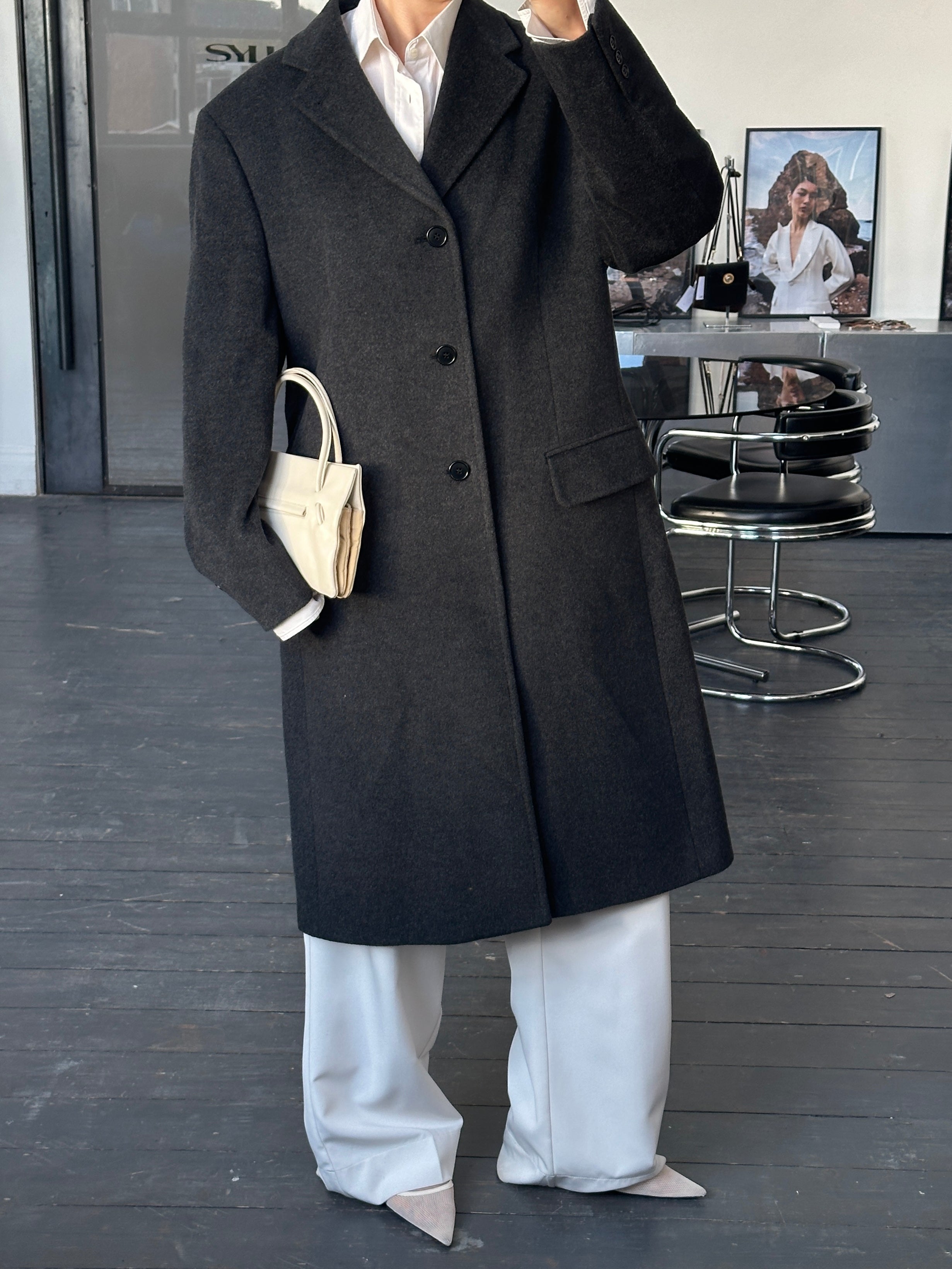 Vintage Italian 1990s wool cashmere coat in XL, with classic tailored design and rich textured fabric.