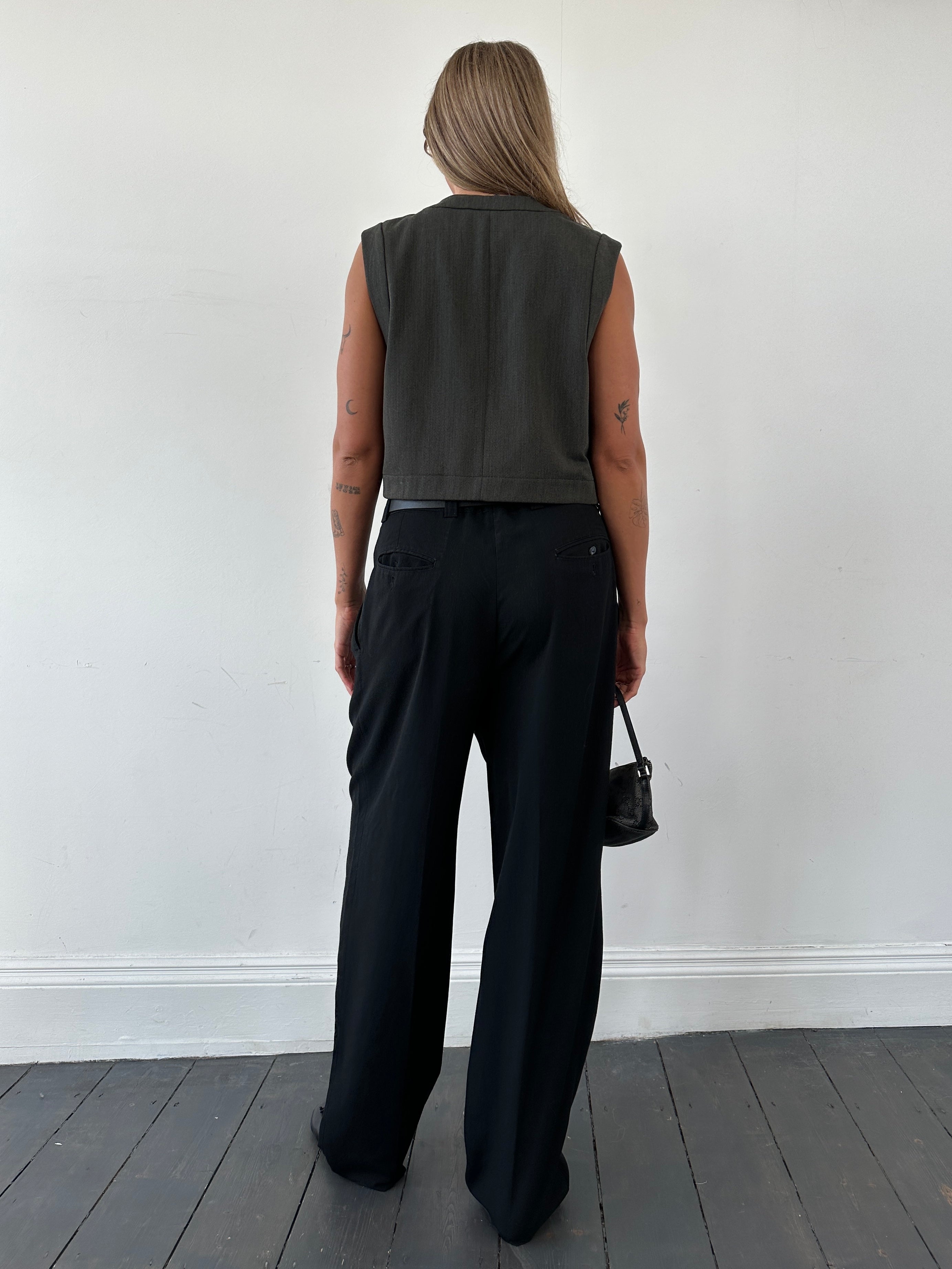 Mani Wool Waistcoat in size L, featuring a tailored fit with a classic design and button closure, made from warm wool fabric.