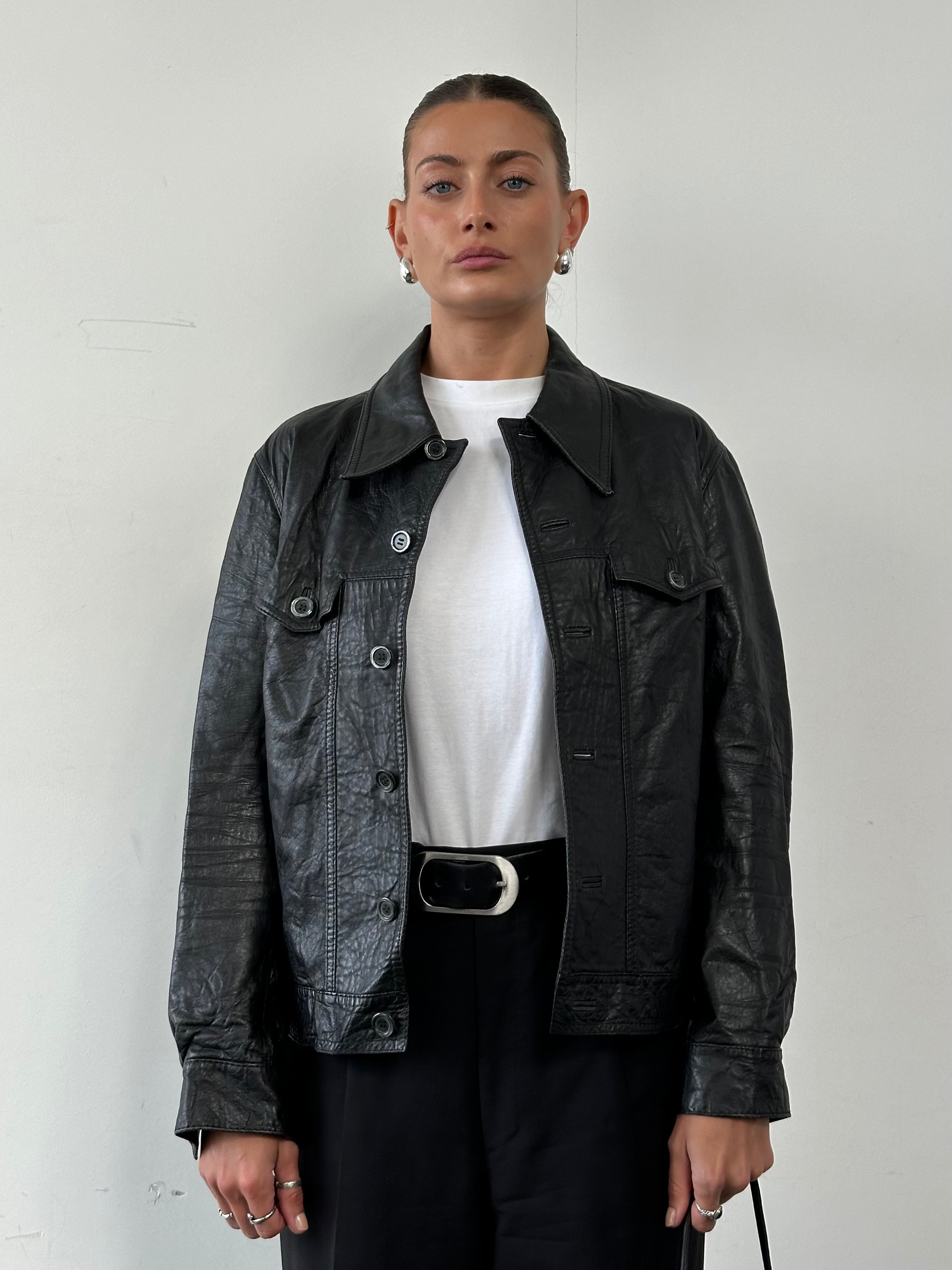 Vintage brand vintage dagger collar leather jacket in size small, featuring a stylish leather design and distinctive collar details.