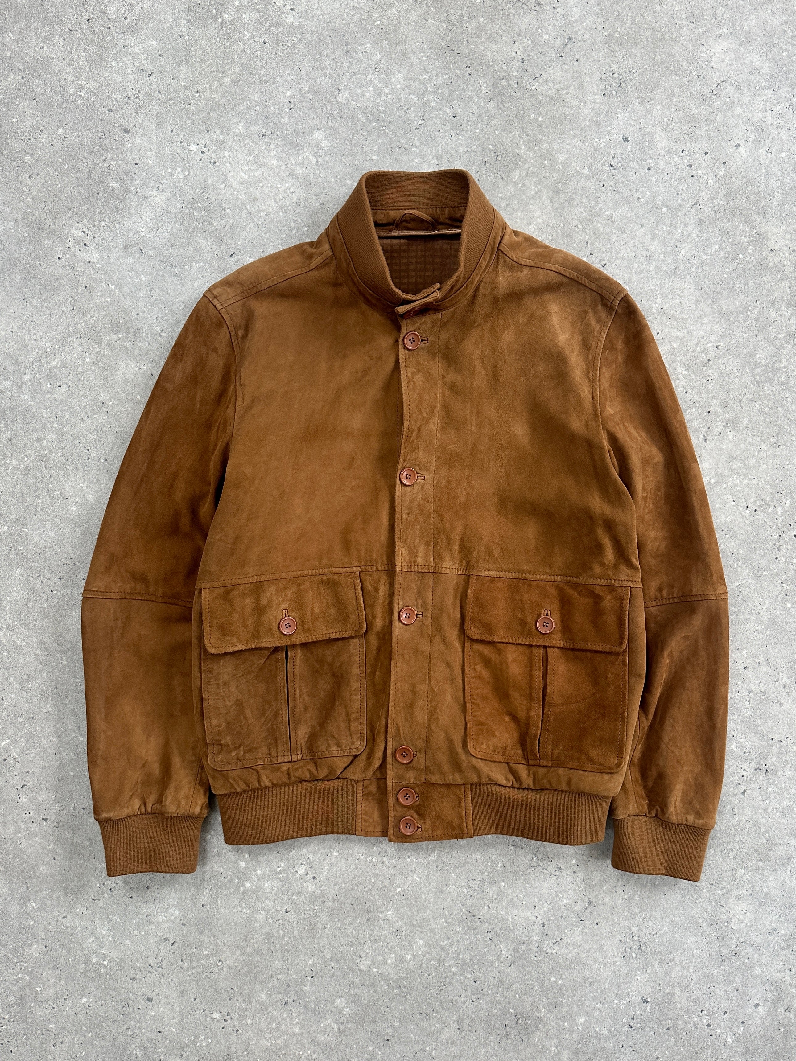 ARMA suede bomber jacket in size L, featuring classic design, soft texture, and stylish fit, displayed on a hanger.