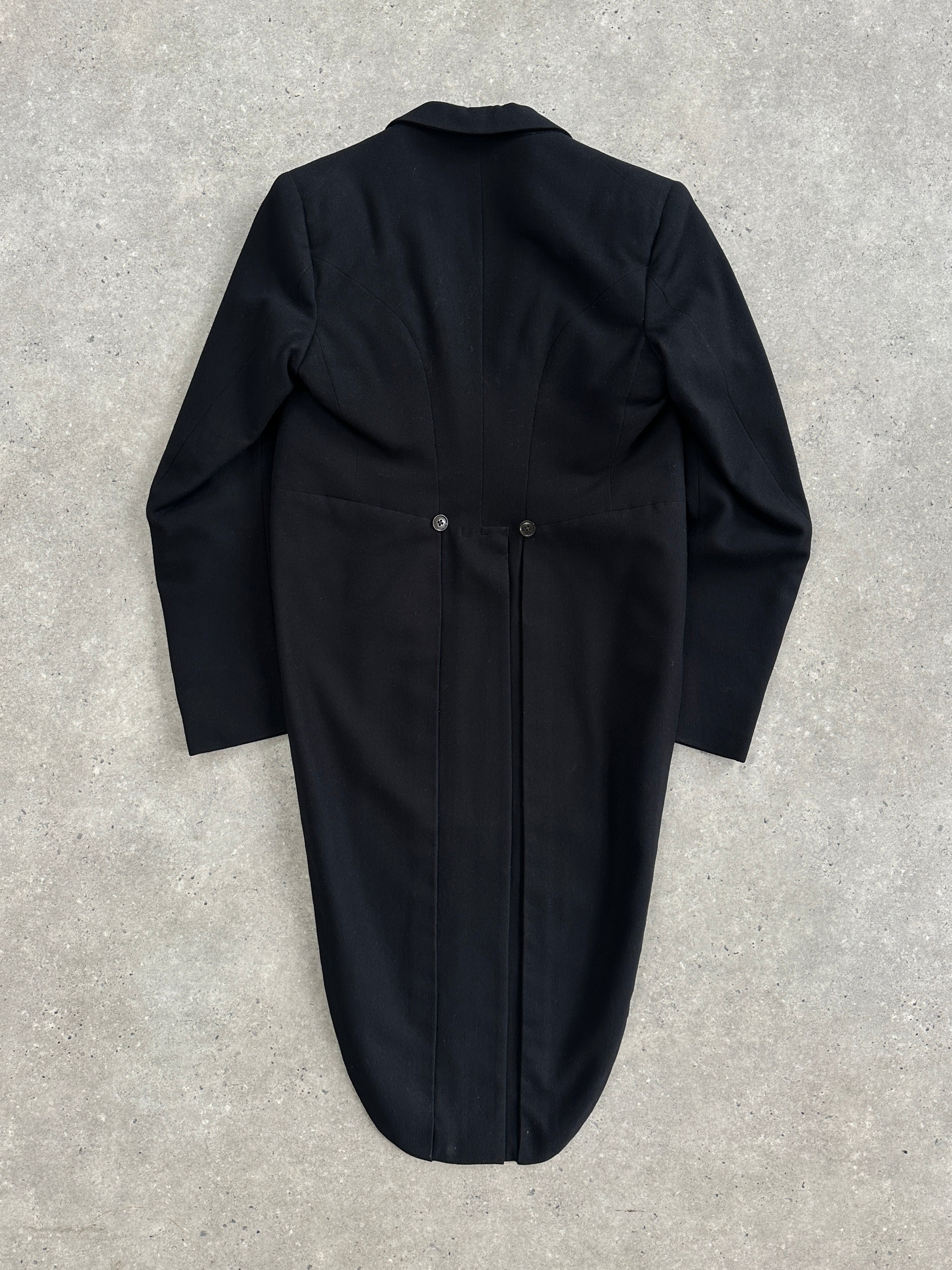 Vintage 1960s wool double-breasted tuxedo tailcoat blazer in classic black, featuring peak lapels and button details.
