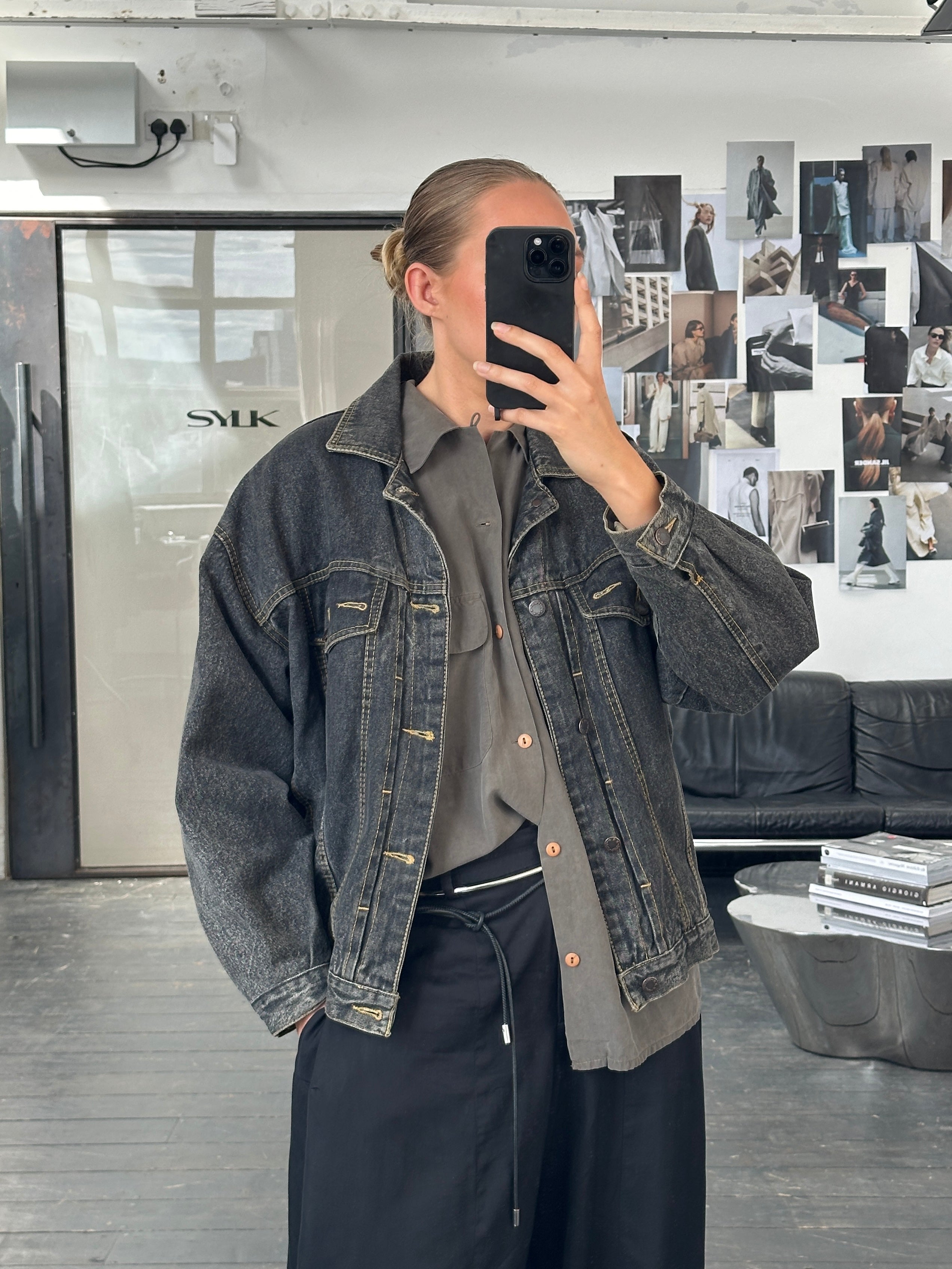 Vintage 1990s boxy denim jacket in size M, casual style with classic blue denim fabric and button-front design.