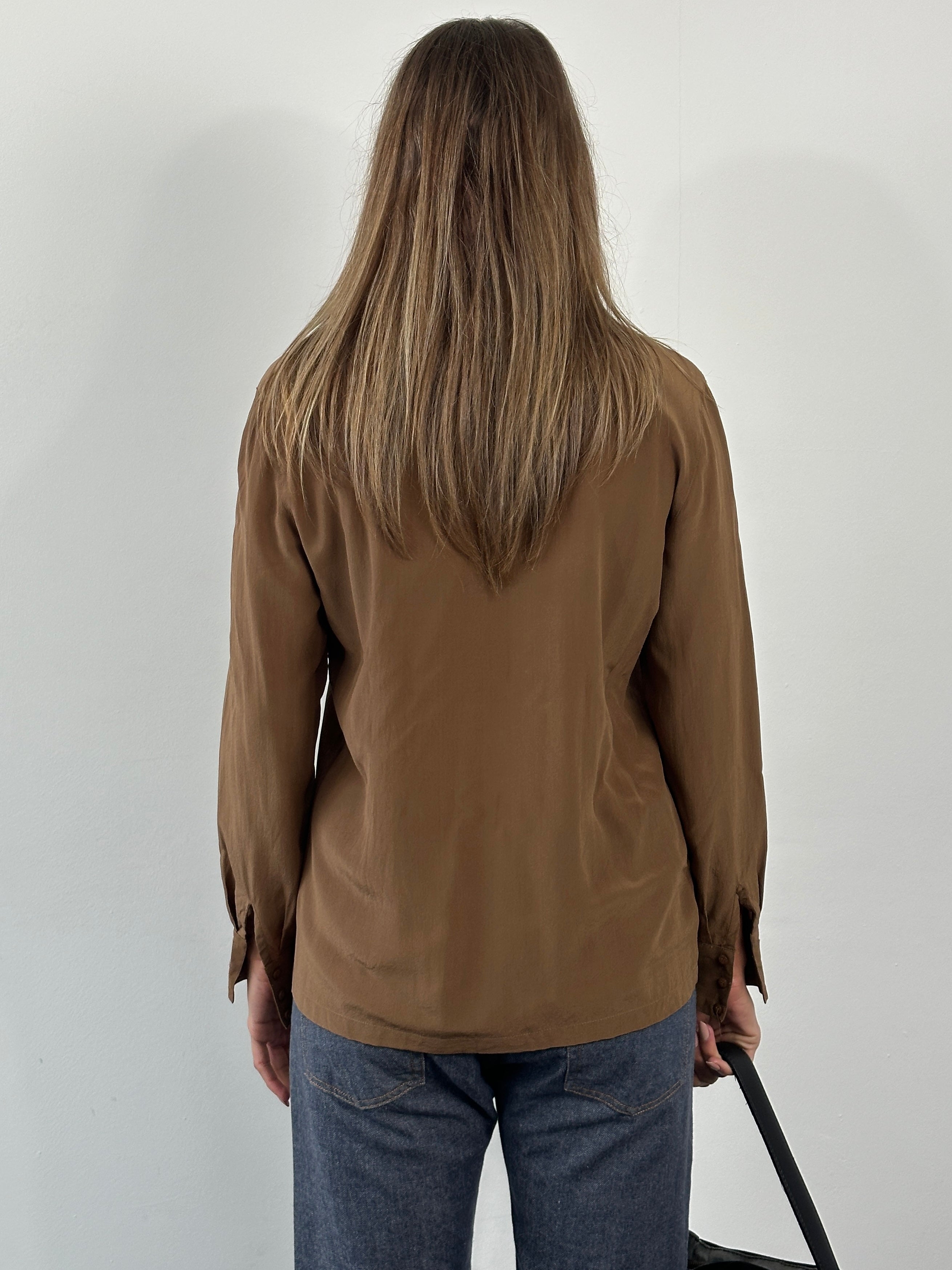 Vintage 2000s pure silk shirt in size S/M, featuring a classic design and smooth, shiny fabric.