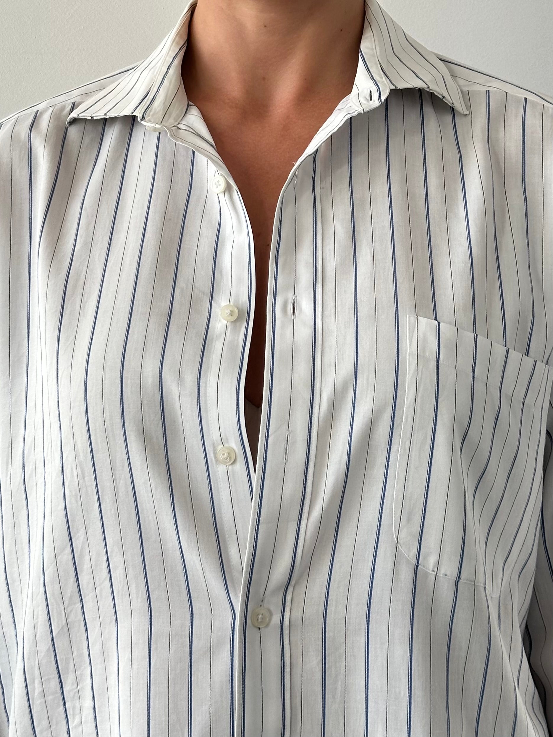 Yves Saint Laurent 80s stripe cotton shirt in M/L, featuring bold colorful vertical stripes and classic button-up design.