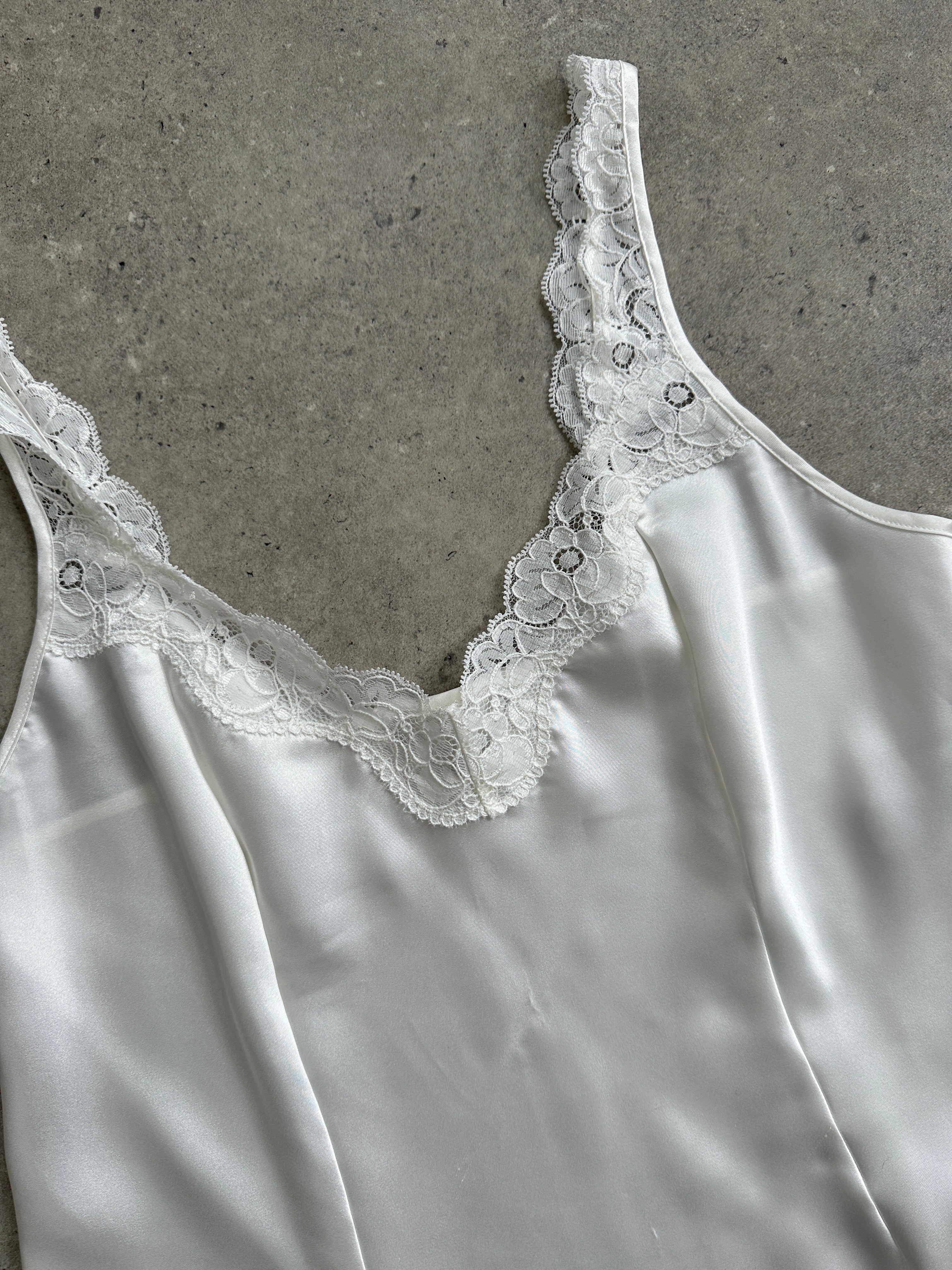 St Michael lace cami top in size M, featuring delicate lace details and a fitted style, perfect for layered or casual wear.