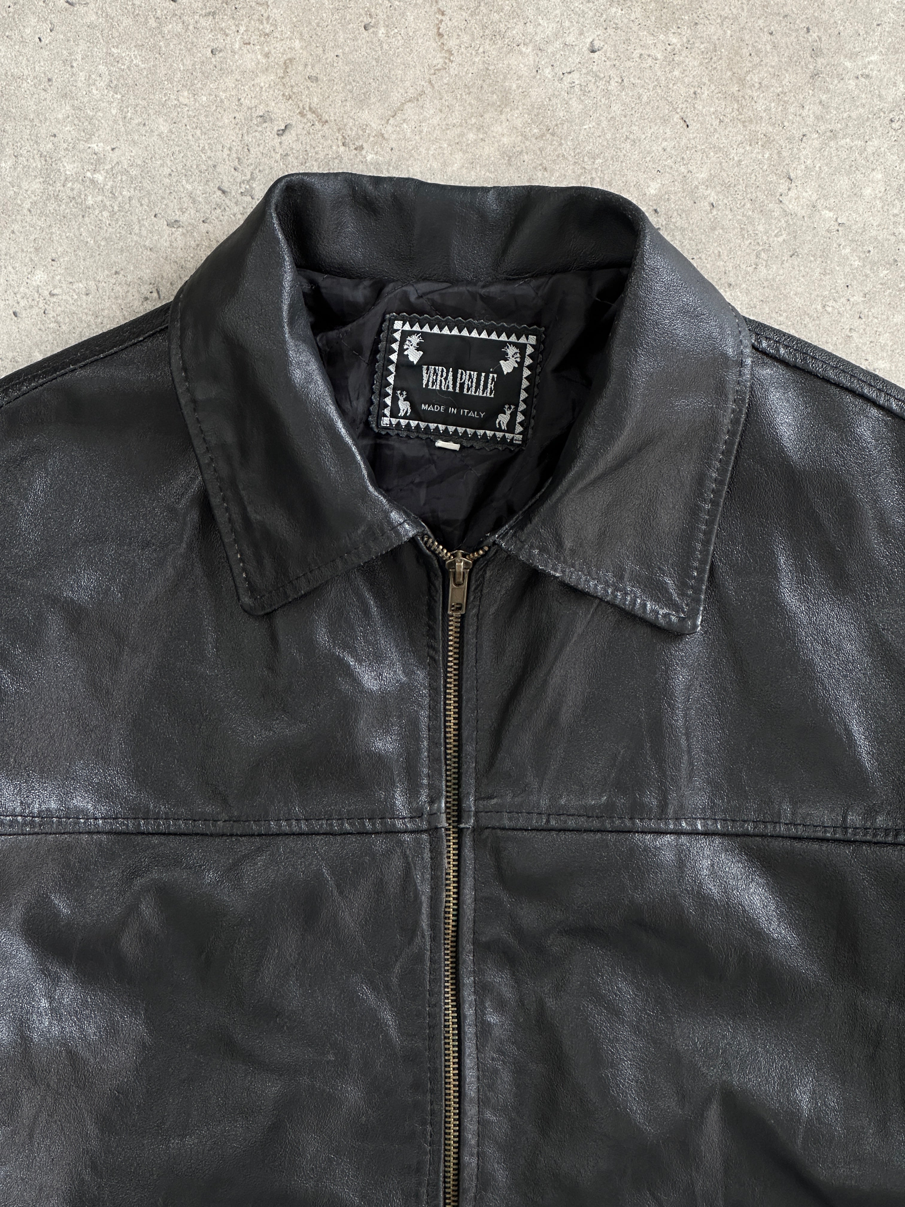 Vintage Italian leather jacket in size L, featuring classic design and rich leather texture.