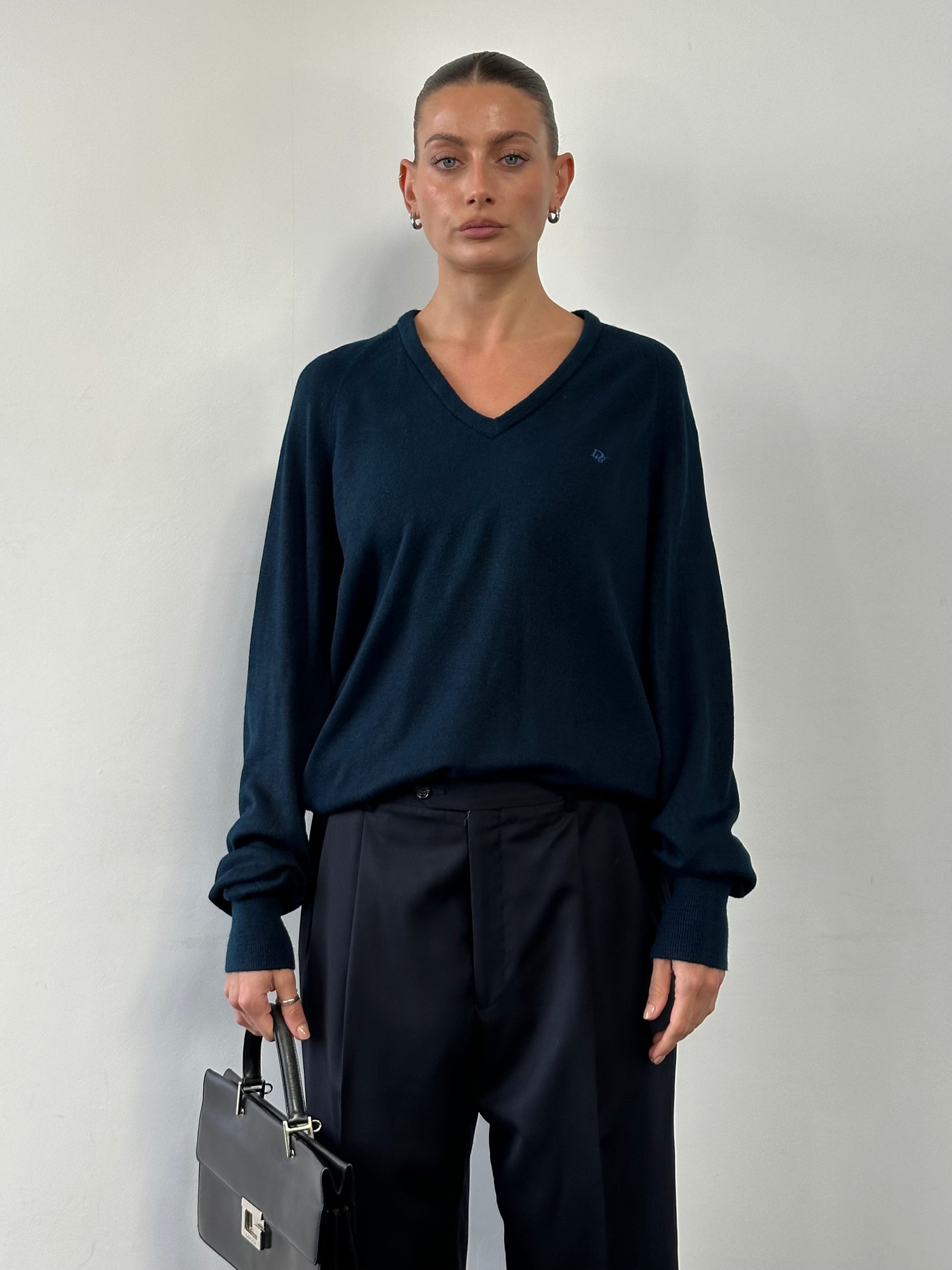 Christian Dior 1980s V-neck logo knitted jumper in size L, featuring a classic design with Christian Dior branding and knit texture.