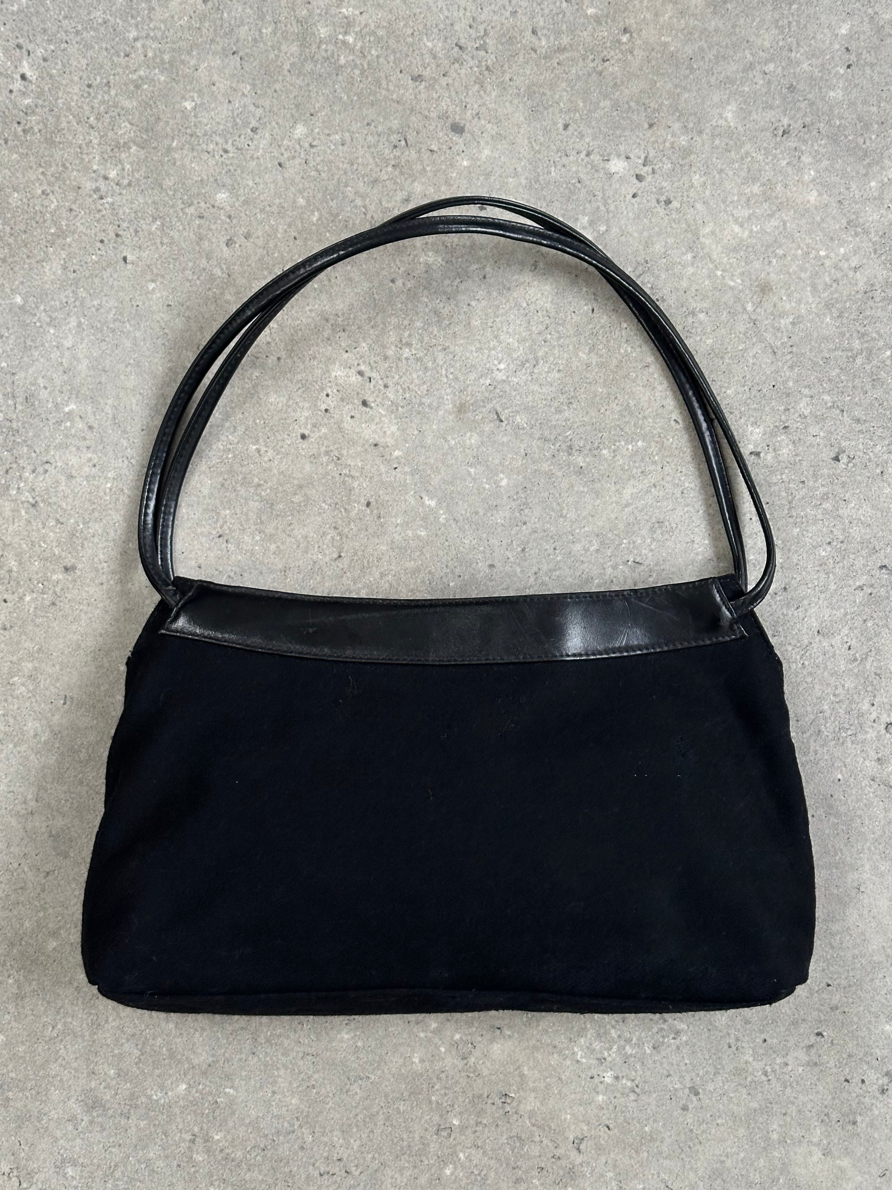 Armani Jeans 2000s wool shoulder bag displaying a stylish design with a shoulder strap and textured wool fabric.