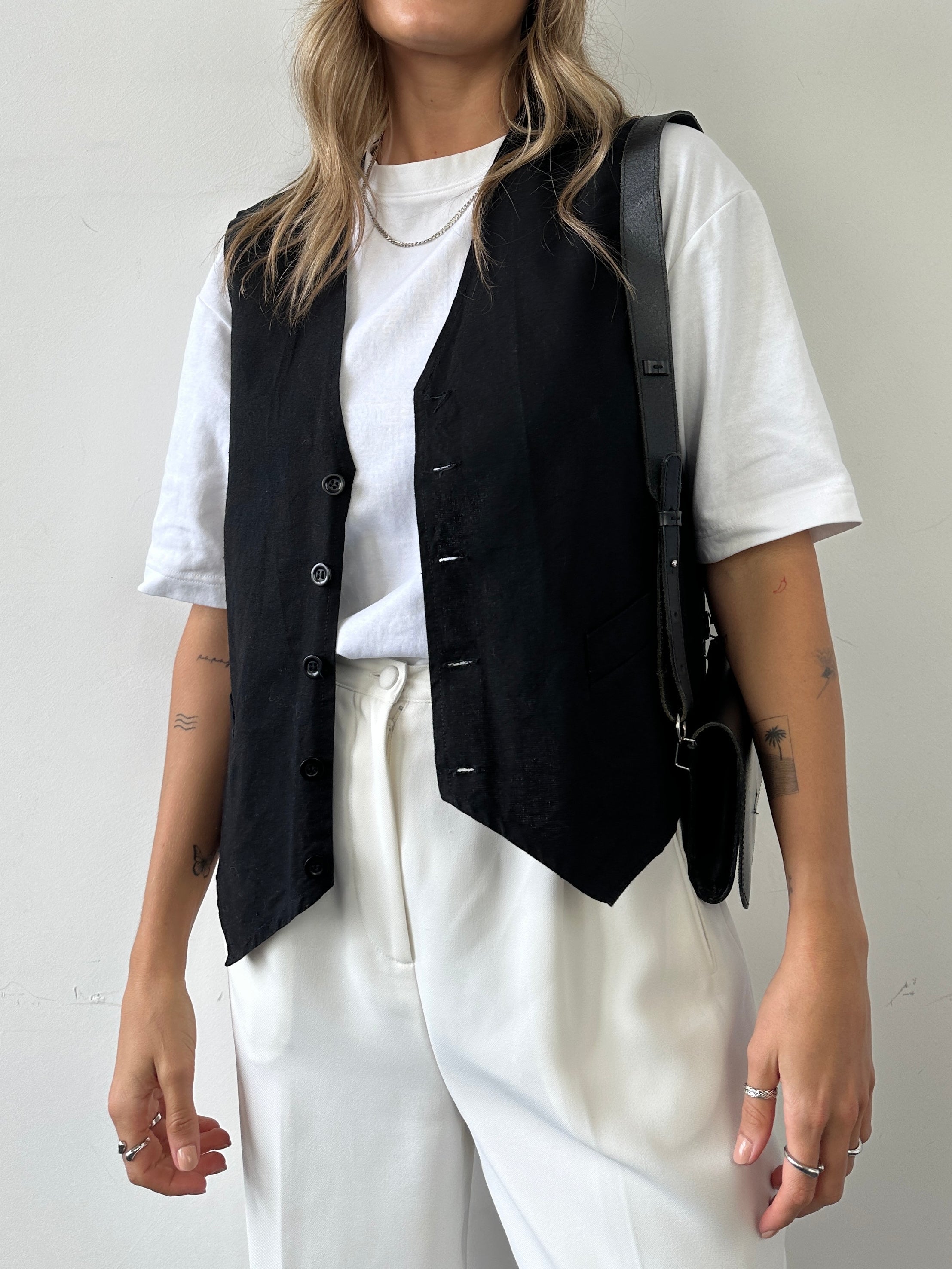 Vintage brand vintage cotton waistcoat coat, XL size, close-up showing textured fabric and classic design details.