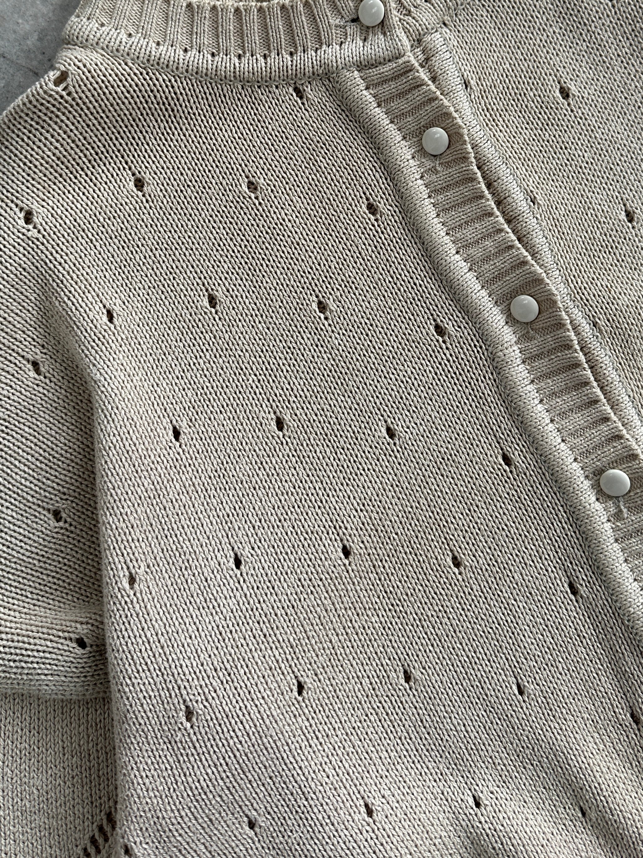 Italian Vintage pure cotton cardigan in size M, featuring classic knit design and button closure, stylish and comfortable.